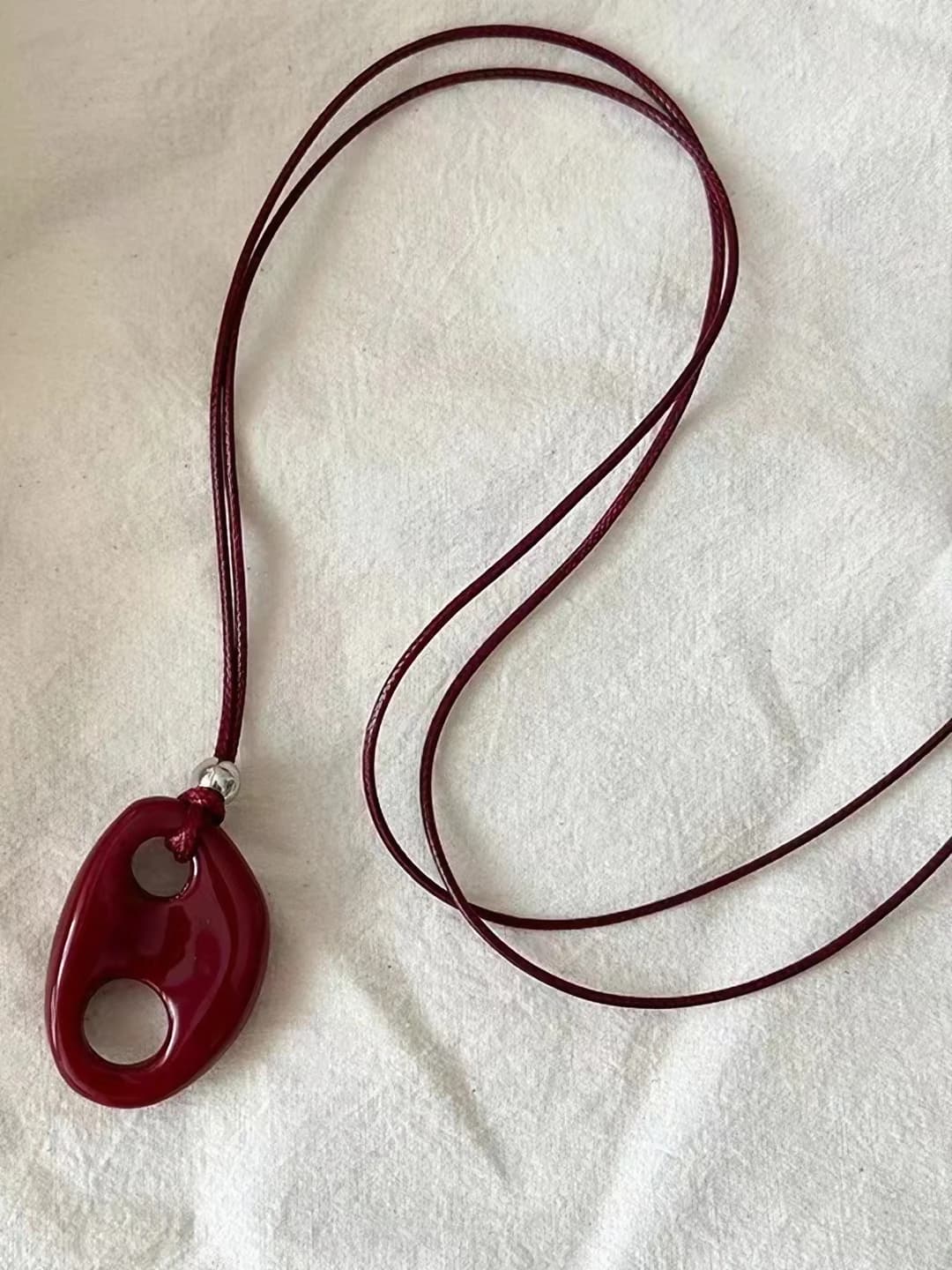 Red pig nose necklace