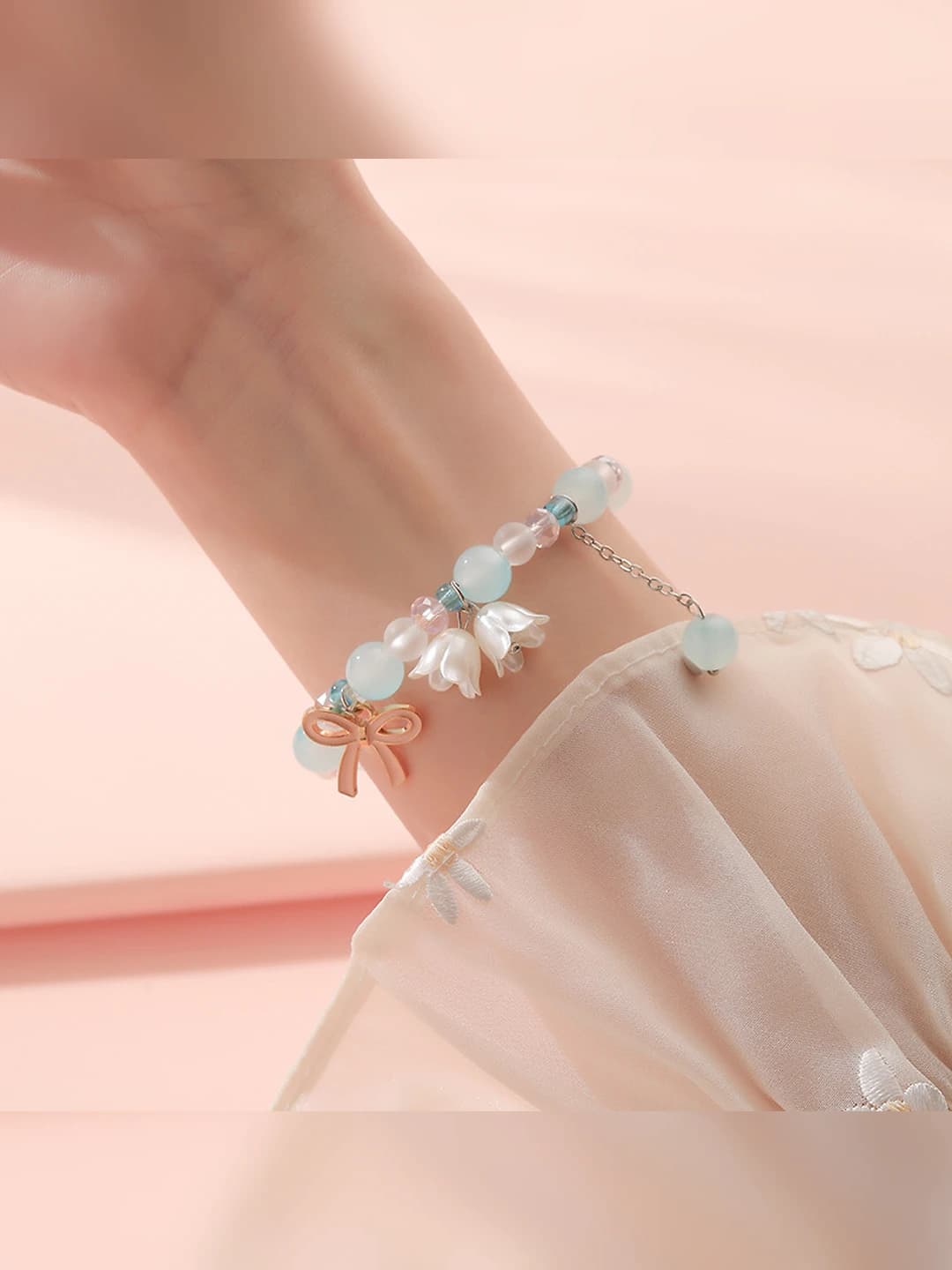Blue butterfly and bell bracelet