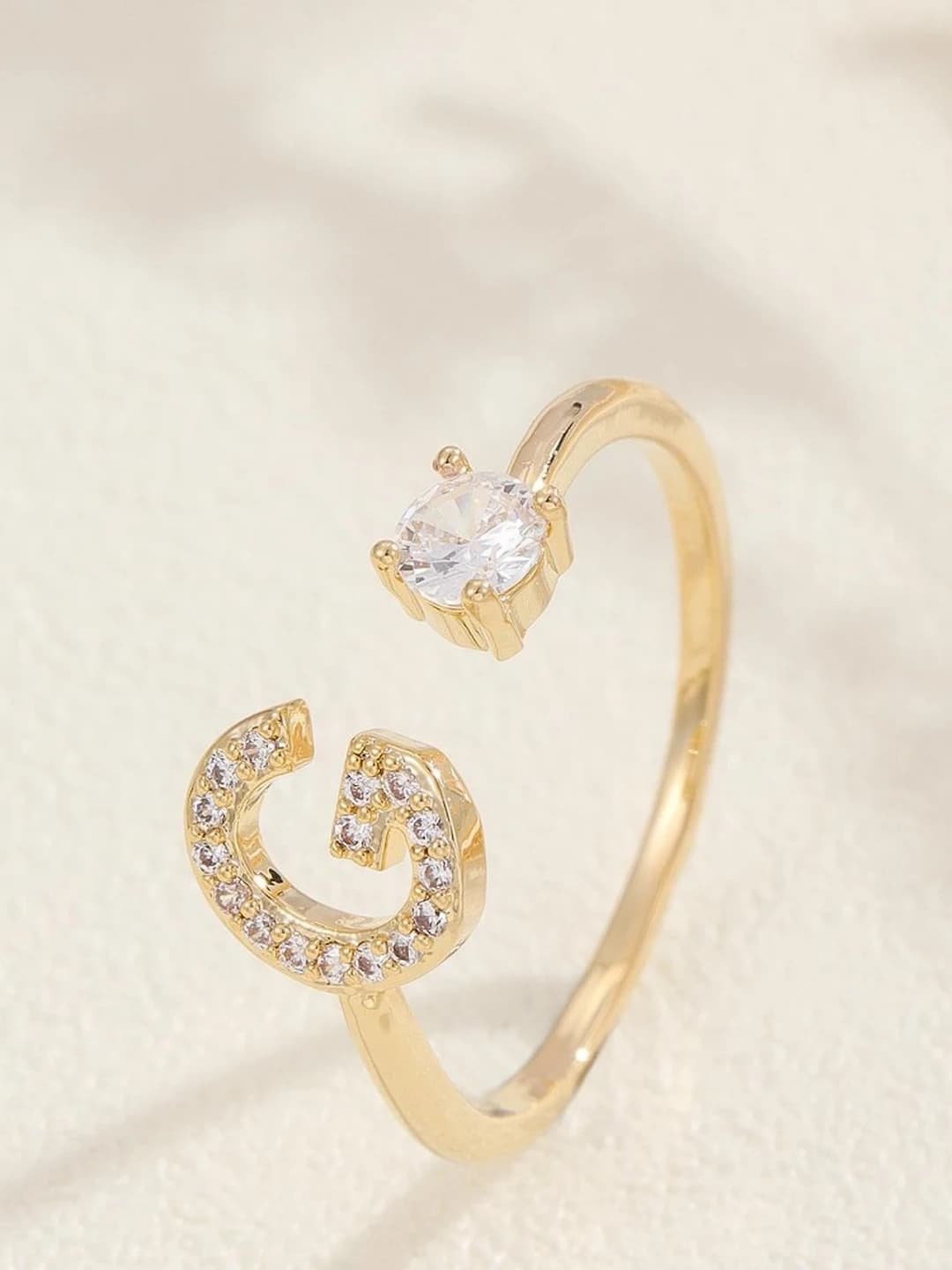 Gold letter G