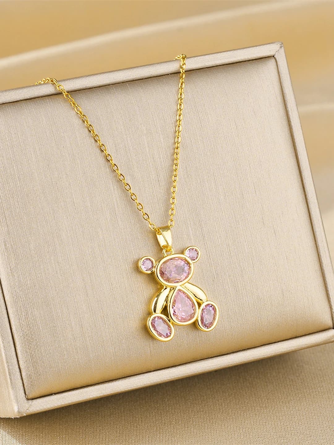 Gold bear, pink