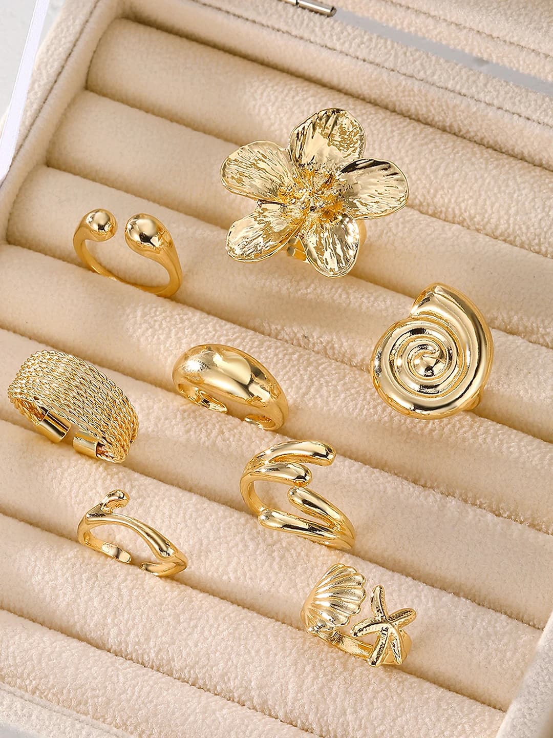 Women's set of open rings with geometric flower design