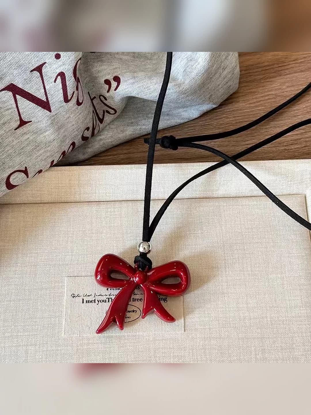Red ribbon bow