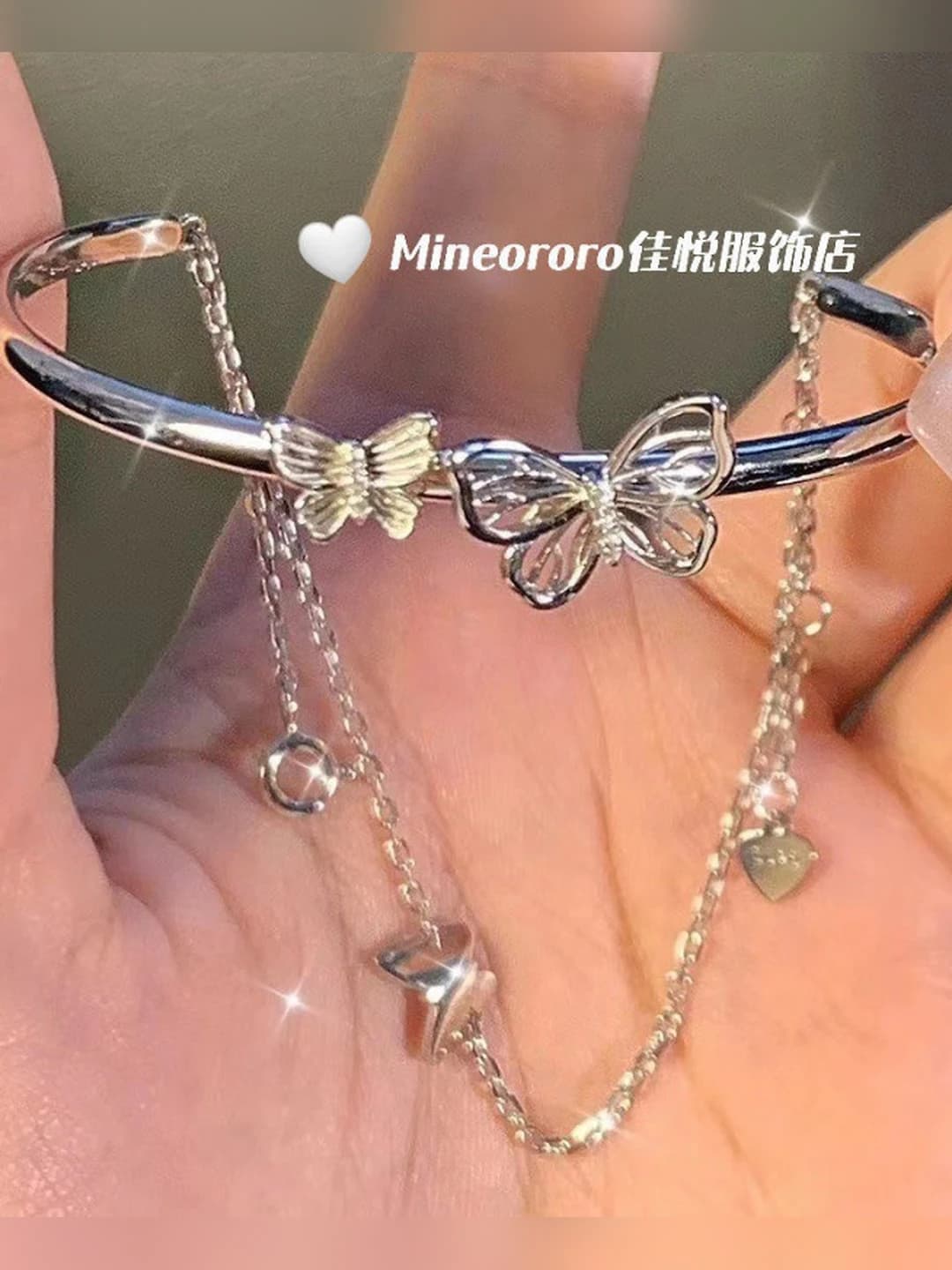 Welded butterfly half bangle half chain