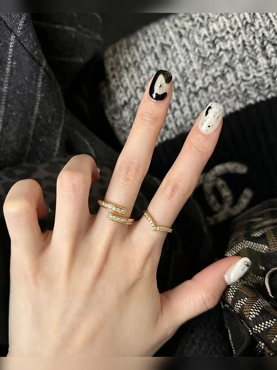 Women's V-shaped ring with stones, open design