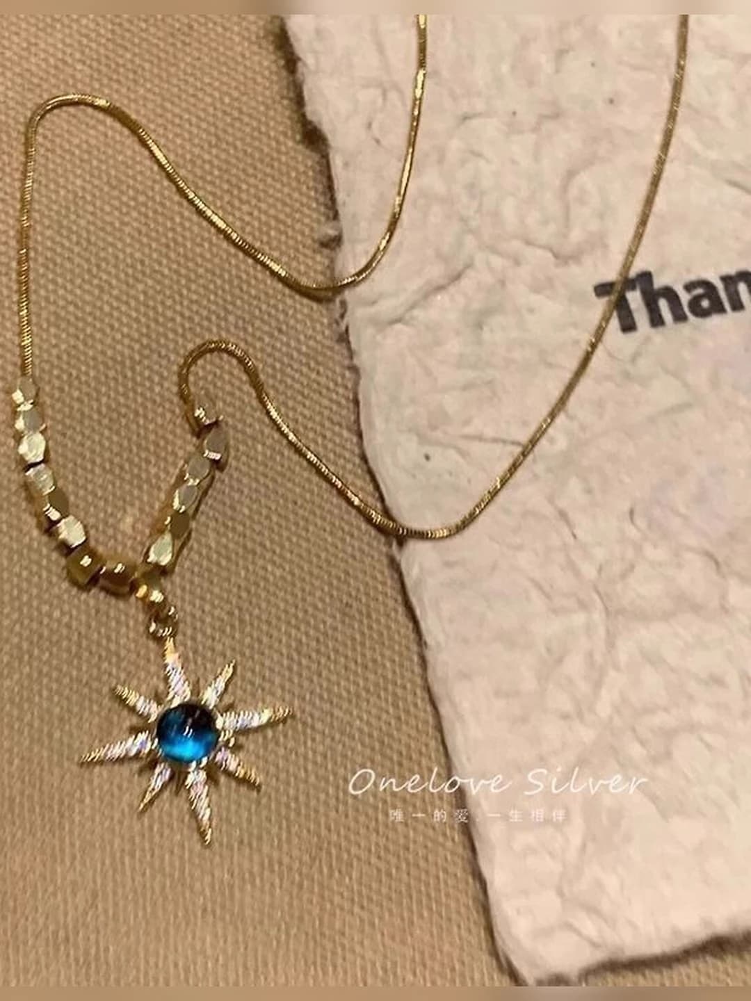 Retro sweater necklace for women, blue alloy with small square pendant and eight-pointed star design element