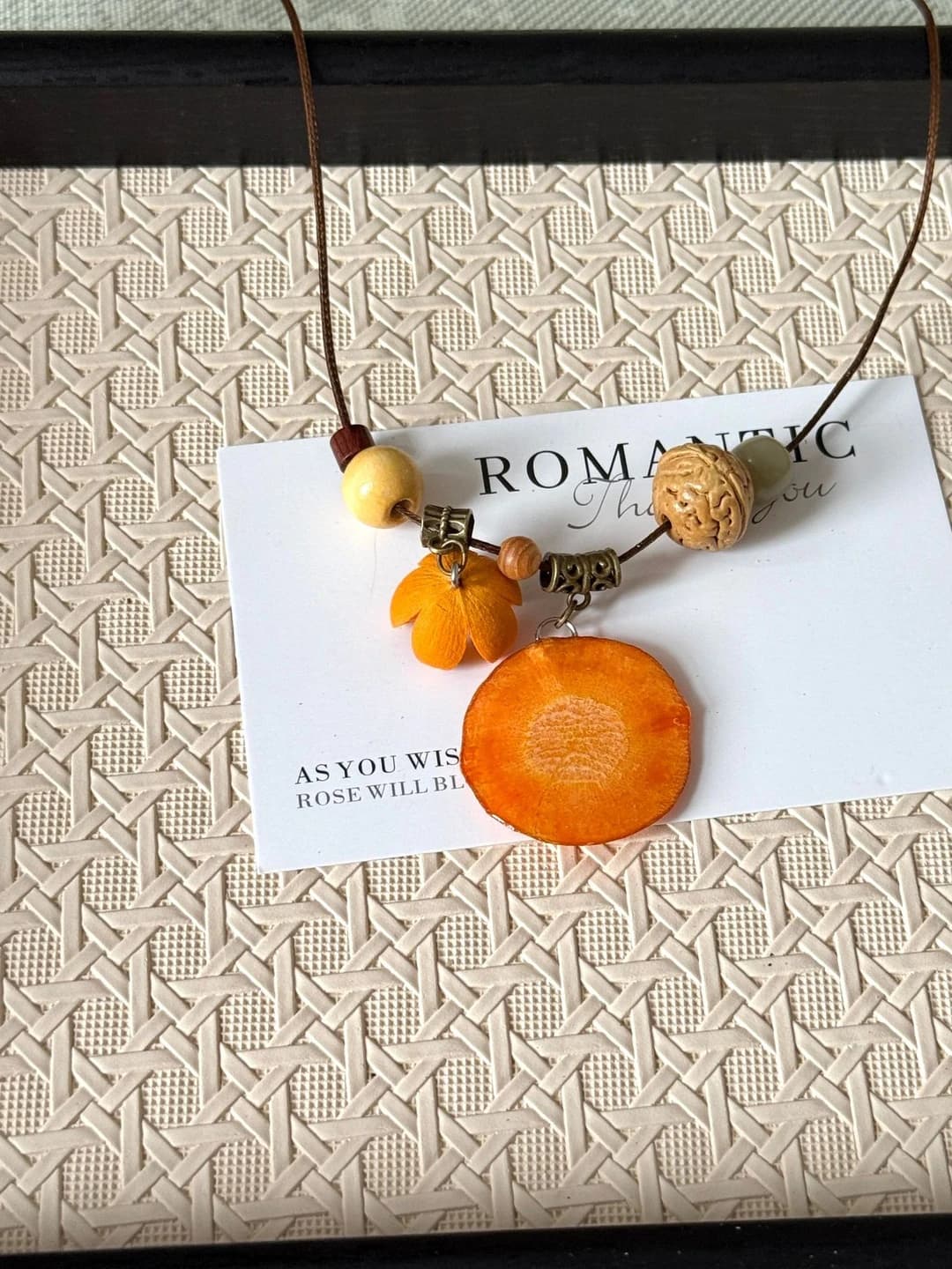 Light carrot necklace