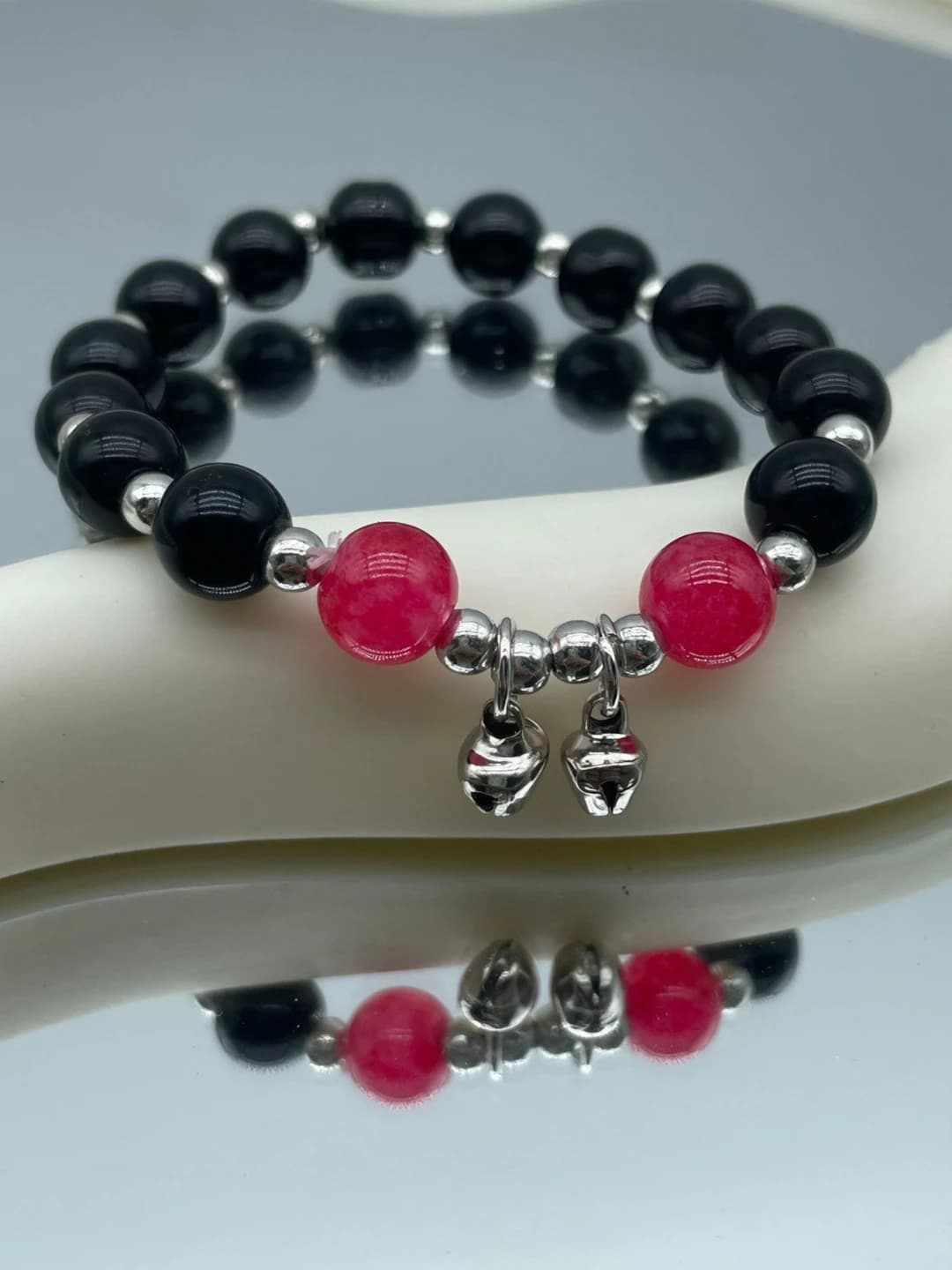 Two dots red-black bell