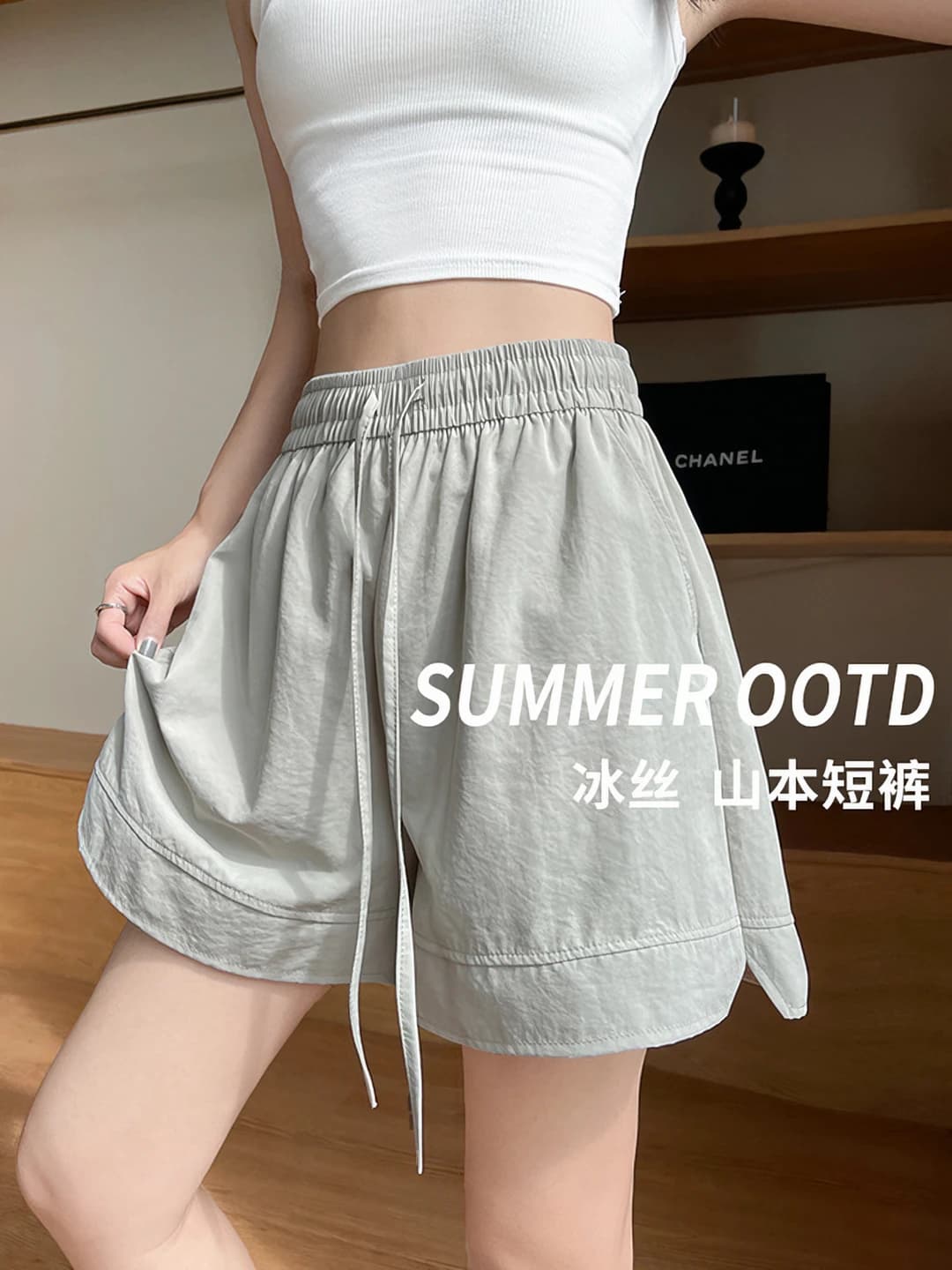 Ayollar uchun yozgi kundalik bo'sh (oversize) tizzagacha shorti, muz-ipak mato, baland bel, sport uslub