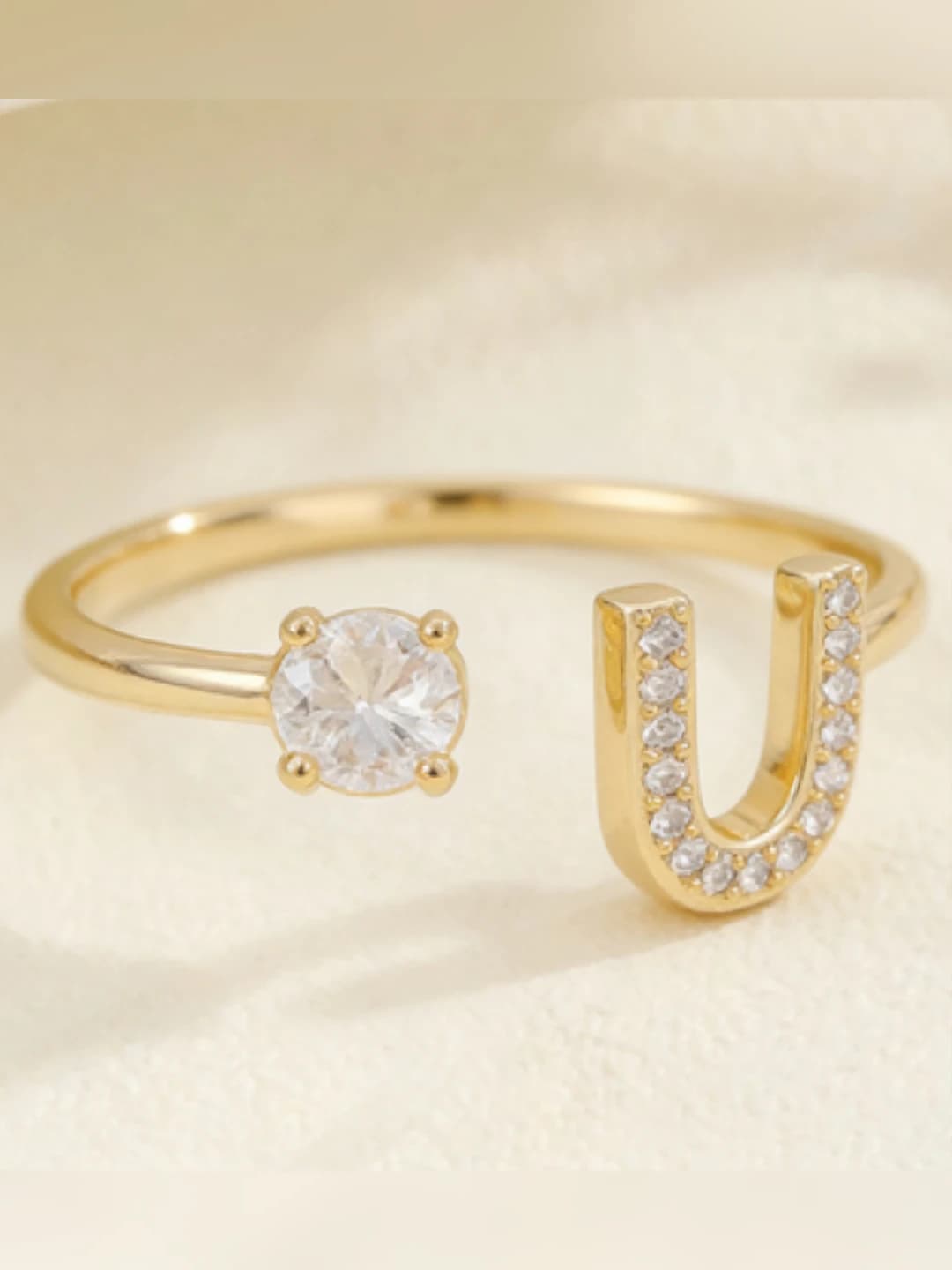 Gold letter U