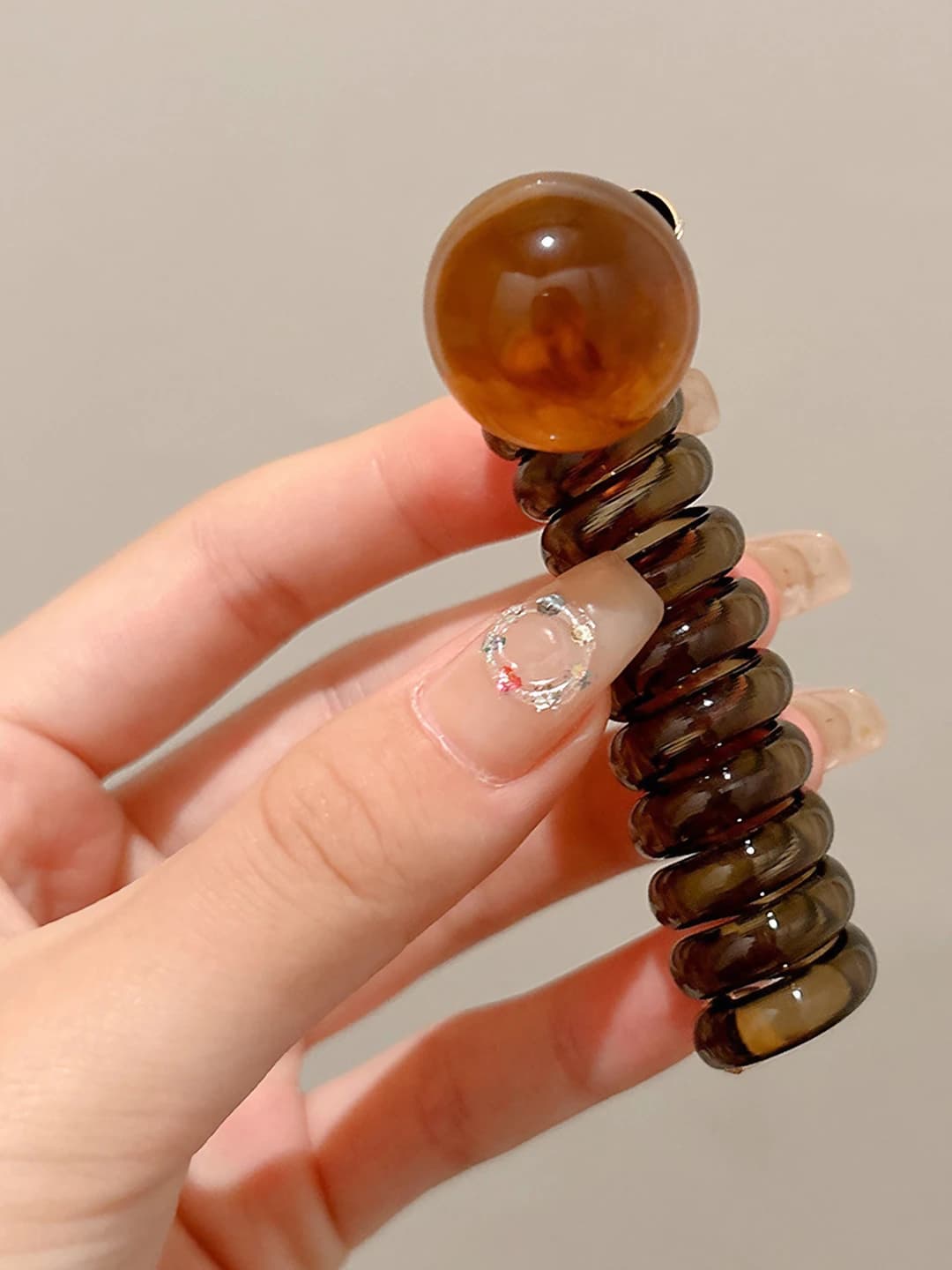 Coffee, telephone cord, caramel pearls