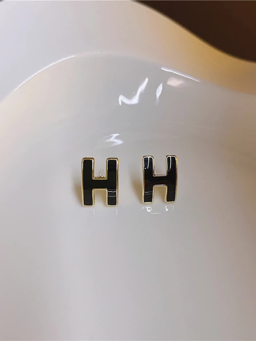 Black H letter