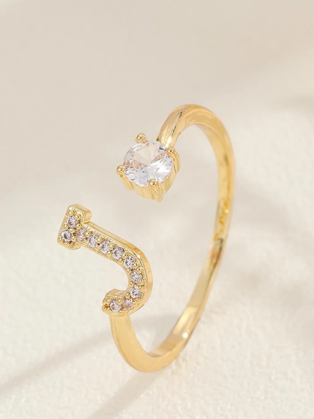 Gold letter J