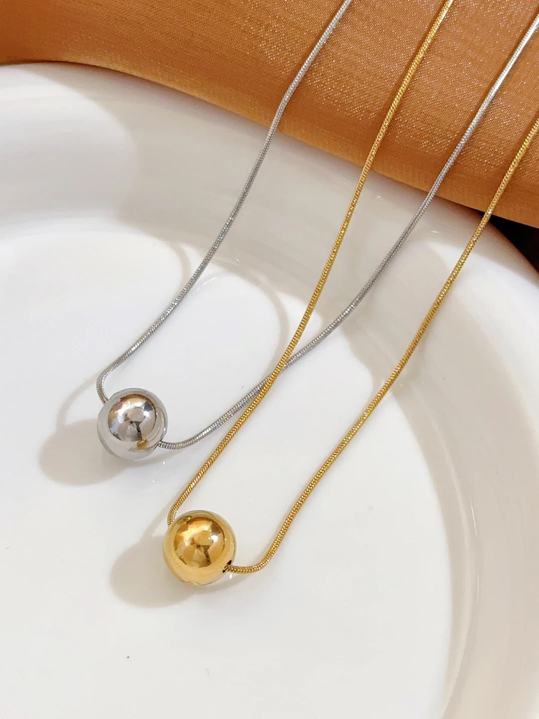 Women's gold titanium steel chain necklace with round beads