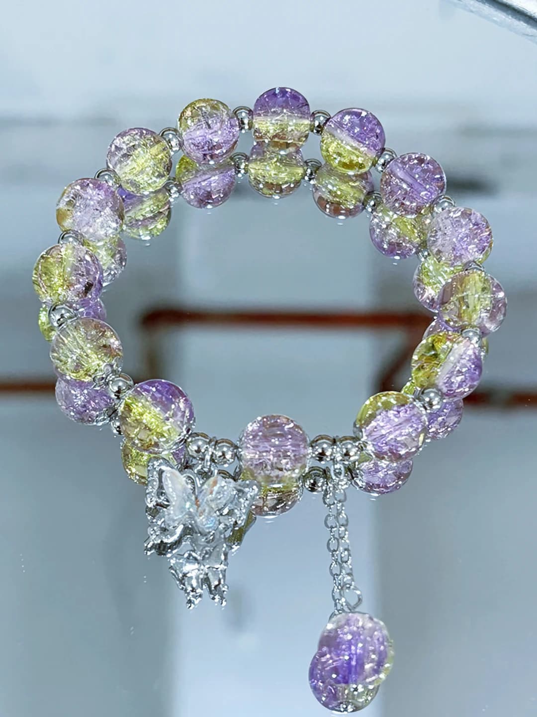 Yellow-purple beaded butterfly bracelet