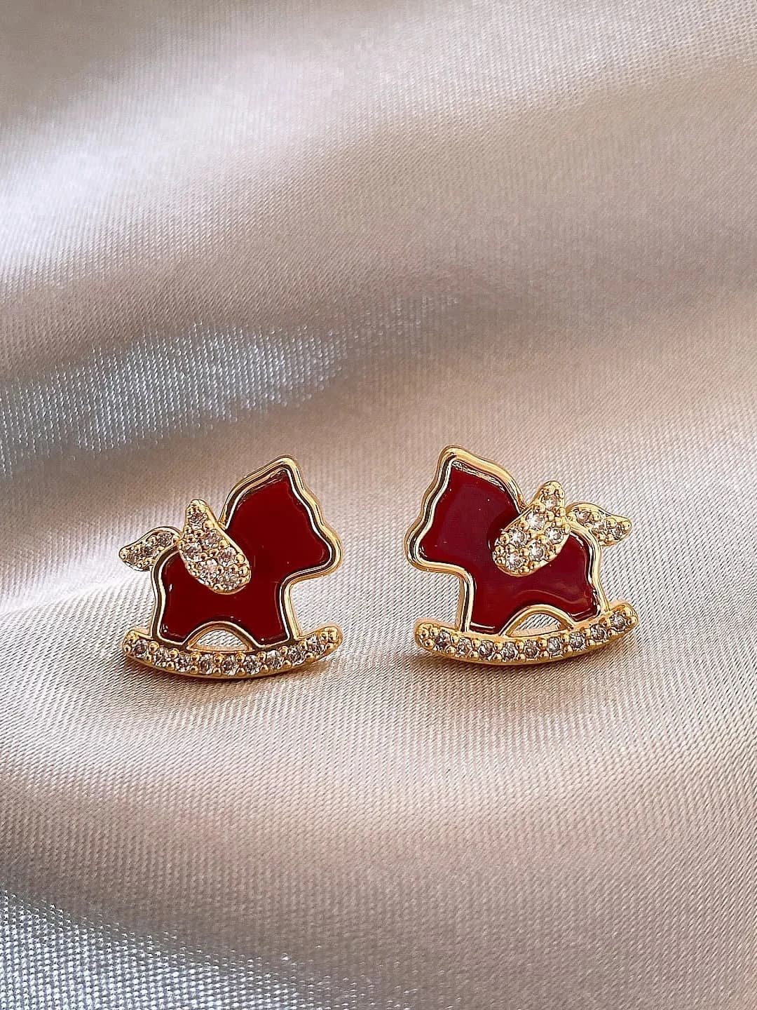 16# Red swinging pony earrings