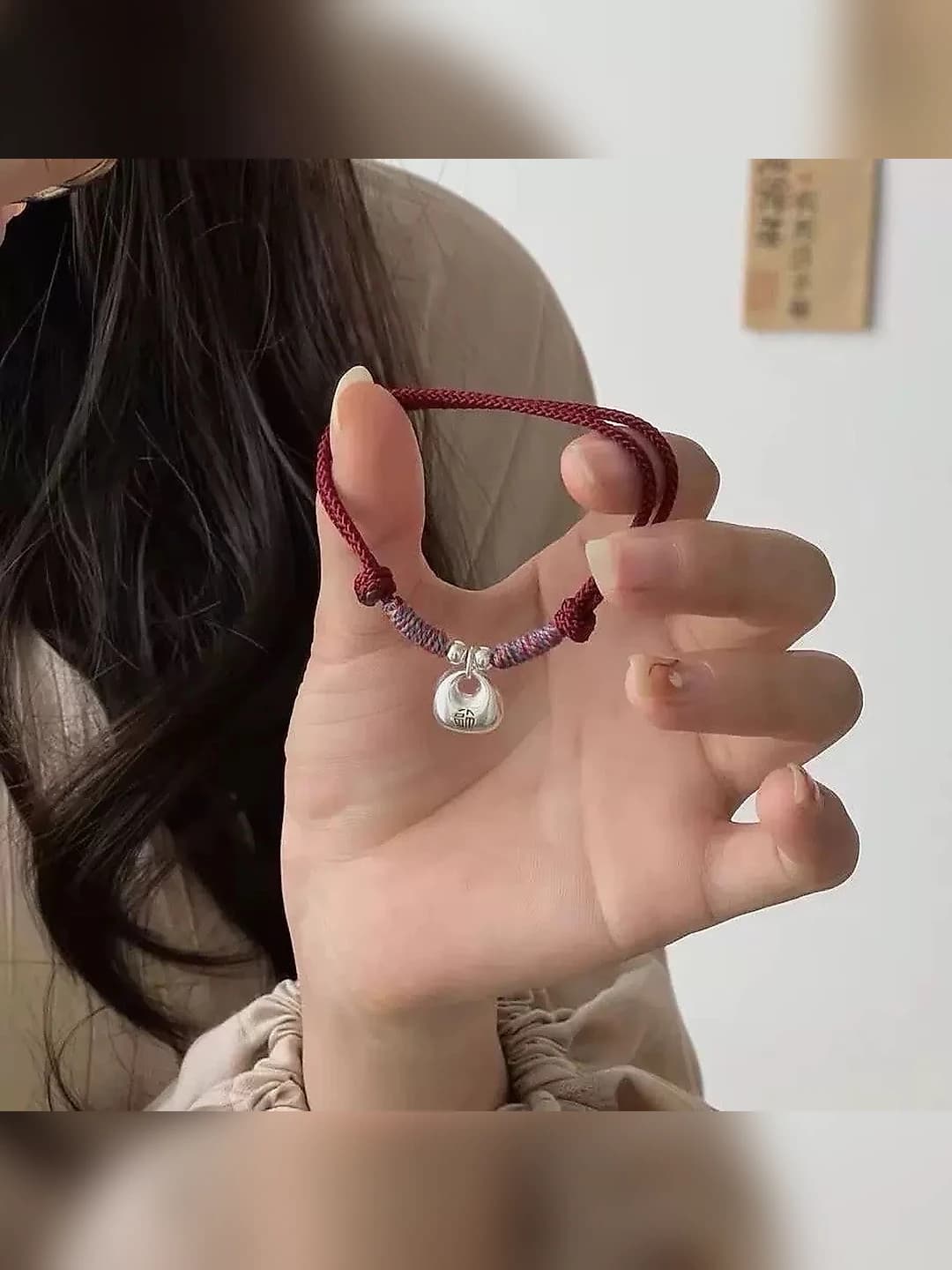 M808 Red string bracelet