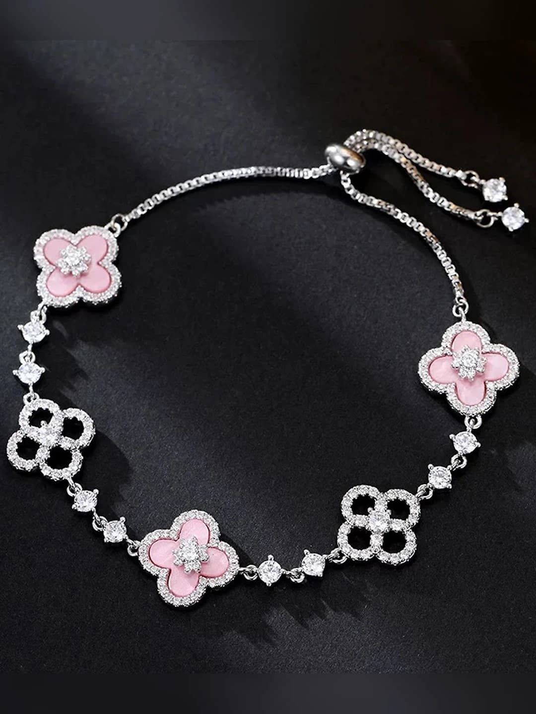 Silver bracelet with pink flowers