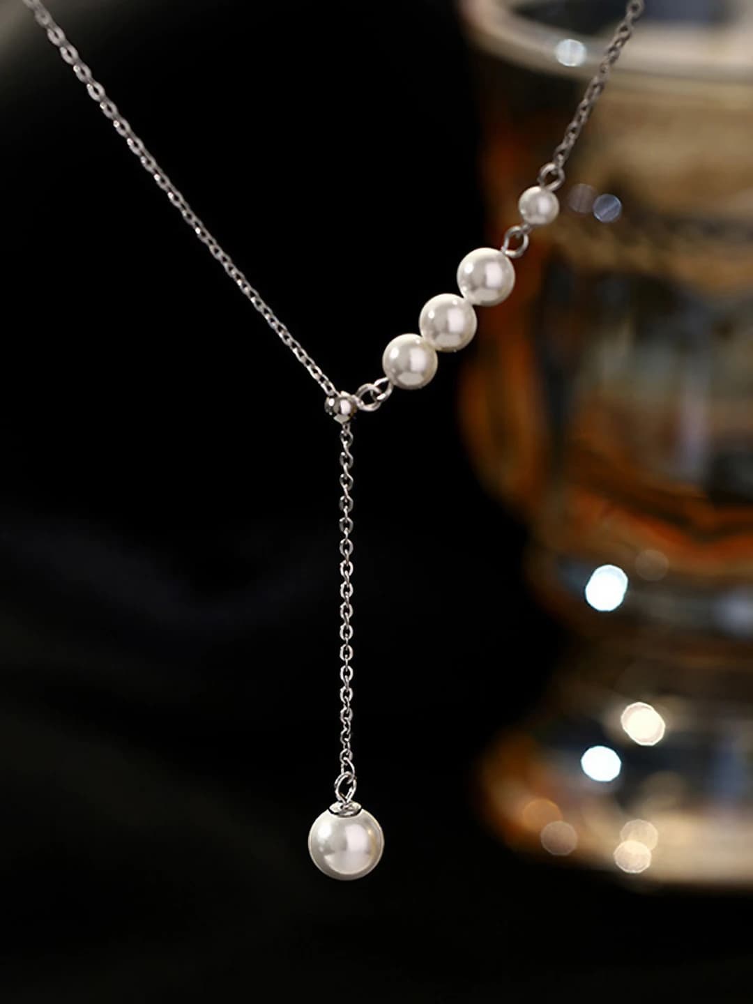 1477# Sliding pearl necklace
