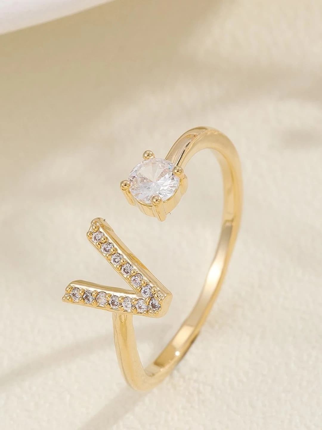 Gold letter V