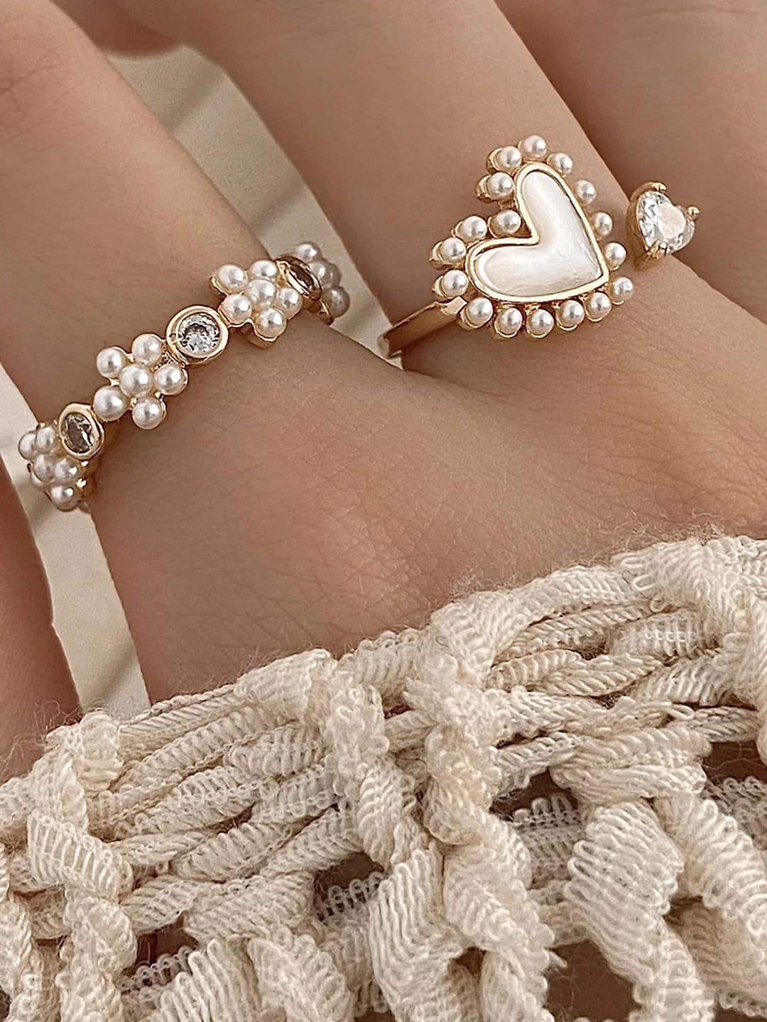 Women's ring made of zircon and pearl in premium style with geometric shape