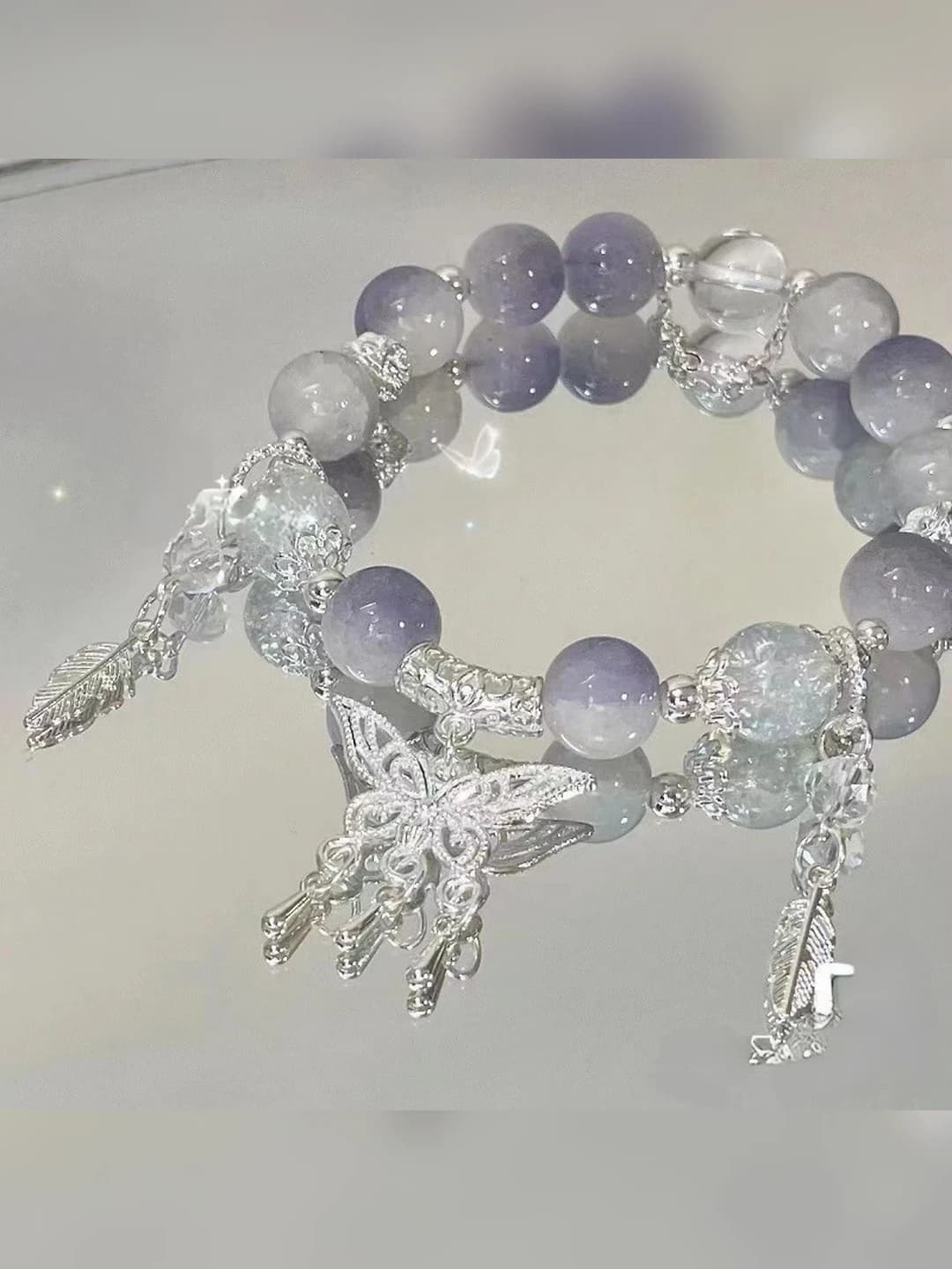 Purple butterfly beaded bracelet