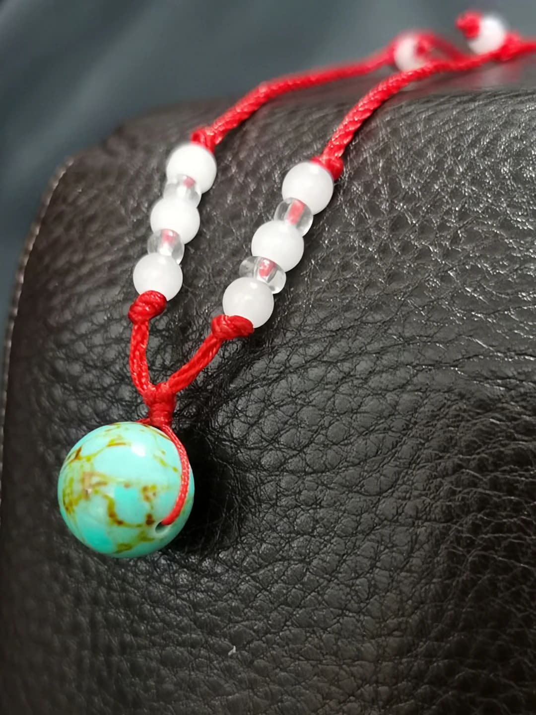 Red cord, turquoise