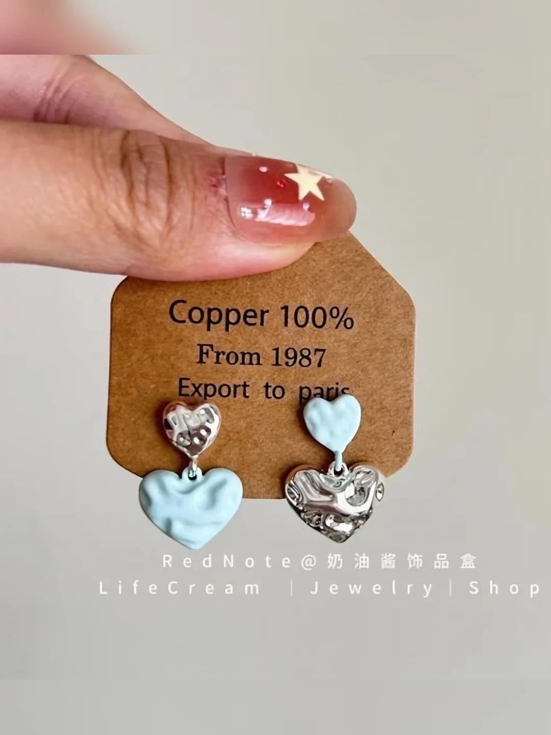 Women's asymmetric heart-shaped earrings