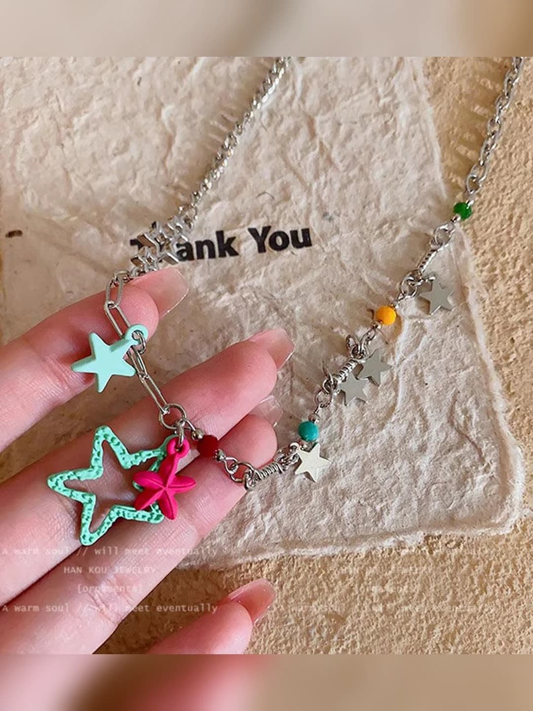 Pink-green star necklace