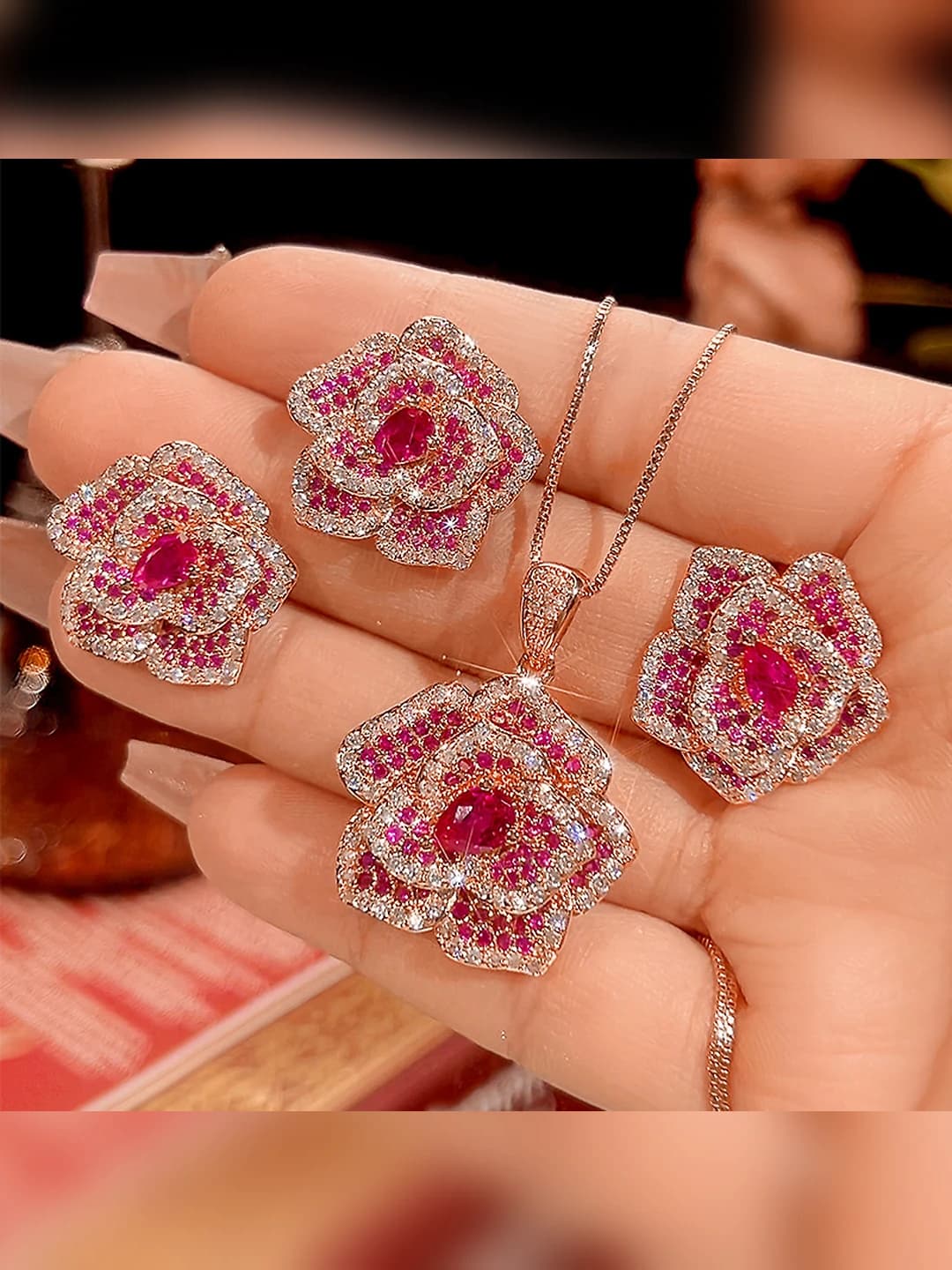 Women's jewelry set with artificial red ruby and rose design on gold-plated copper base