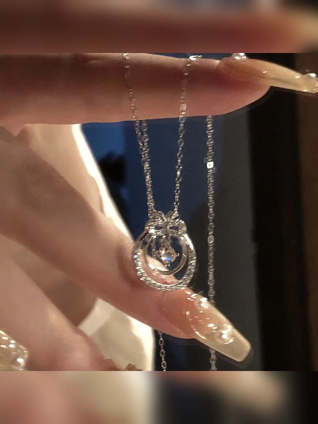 Flower and bow necklace