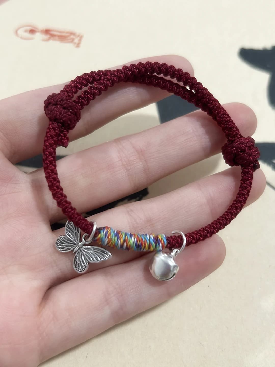 M755 Butterfly Bell Bracelet Red Cord