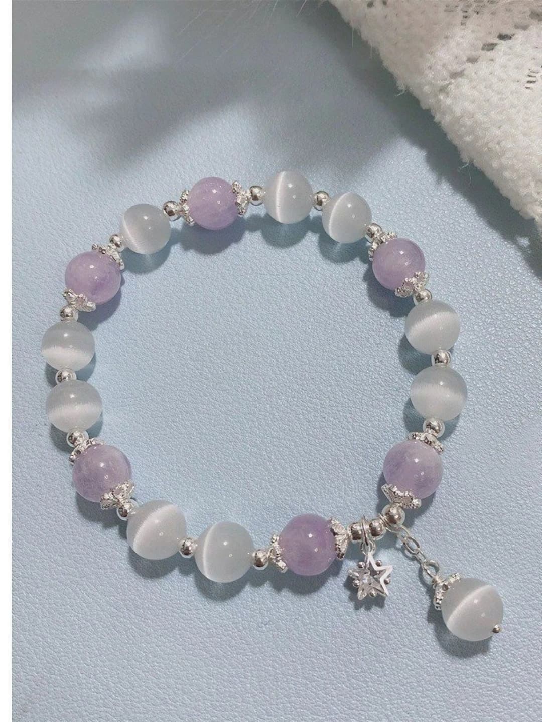 Fake cat's eye purple star bracelet