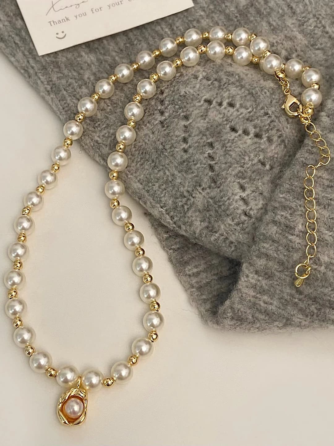White pearl gold pea pendant necklace