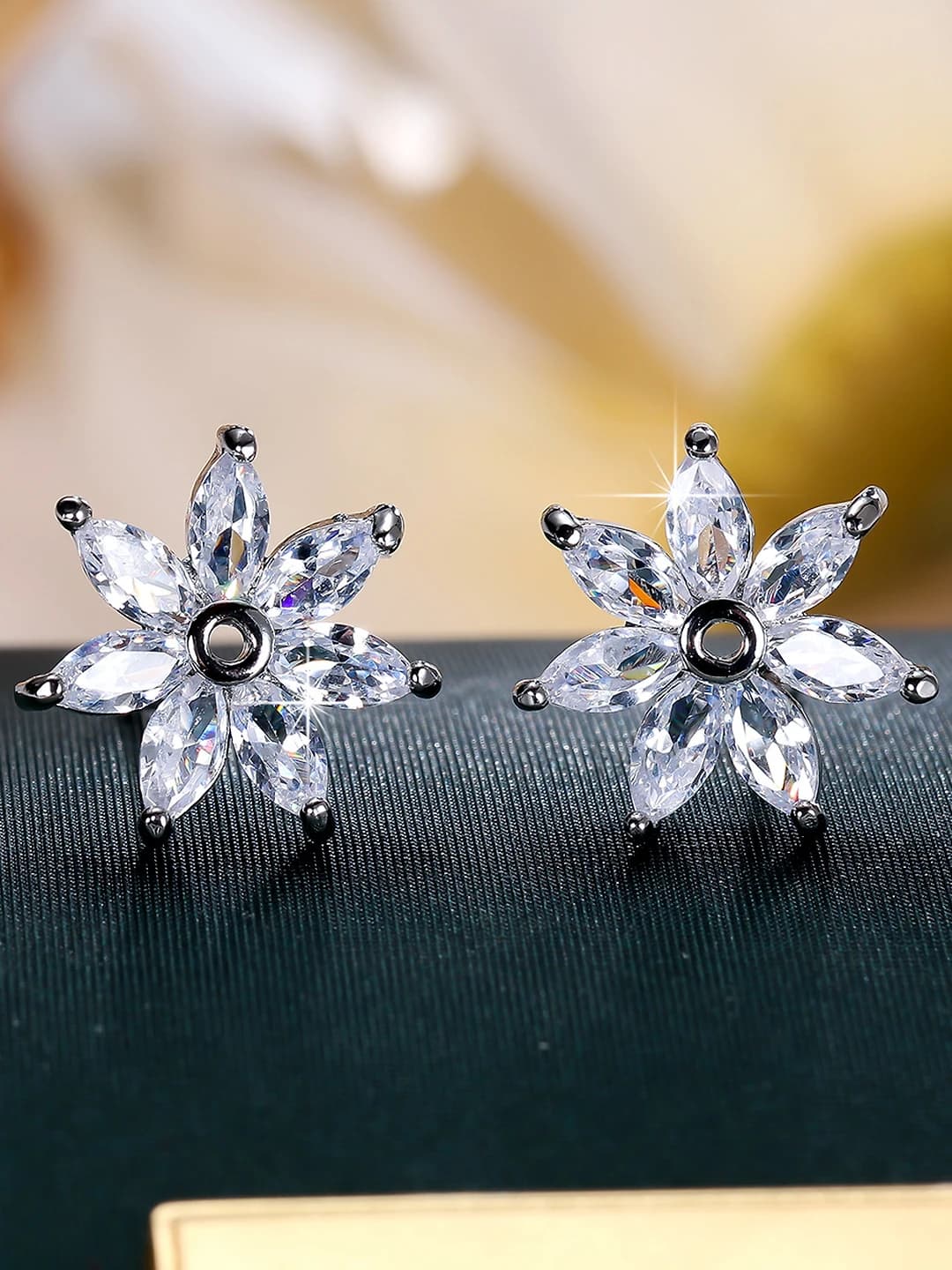 Women's 7-petal flower earrings with marquise-cut zirconia petals and a hollow center ring design