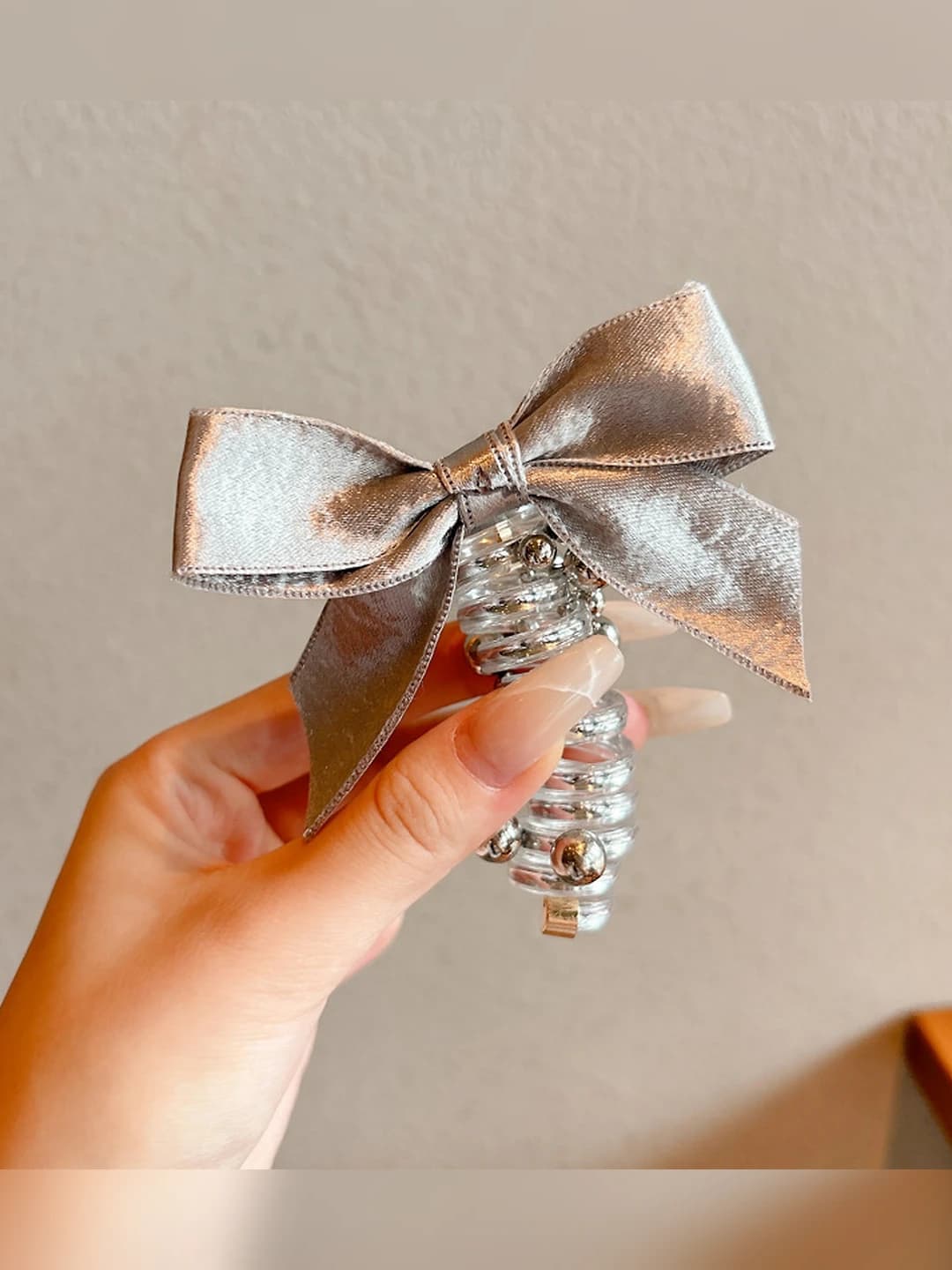 1# Large bow phone cord hair tie
