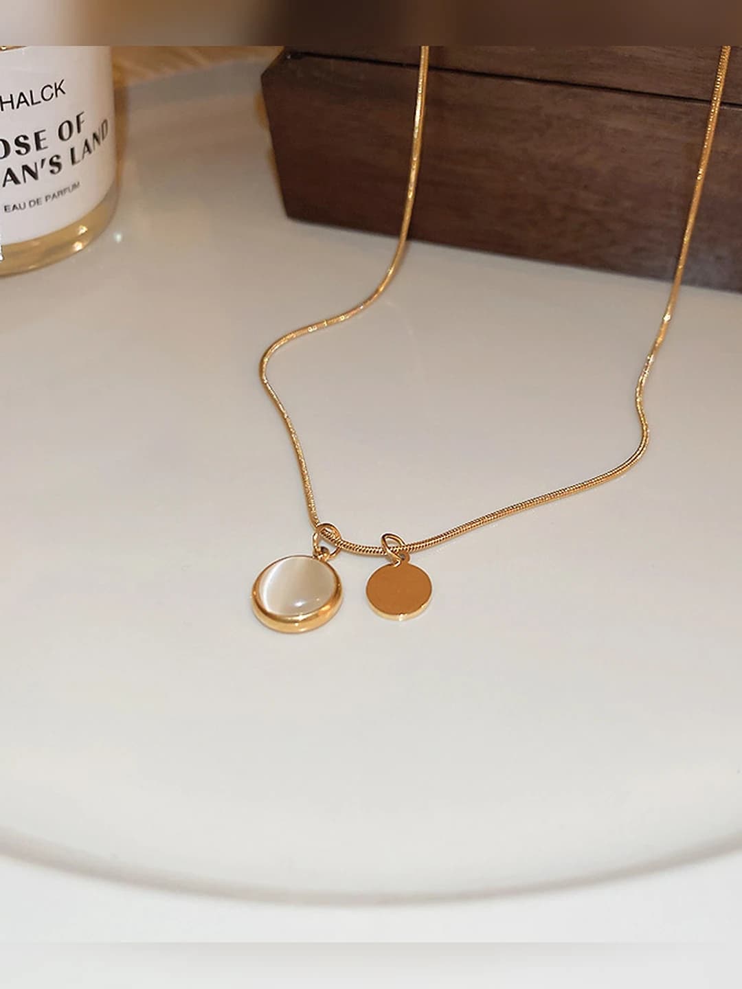 Gold, round, titanium steel