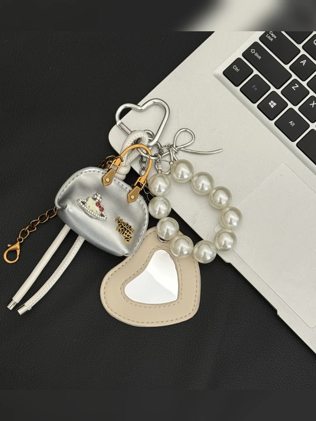 Silver cat mirror charm