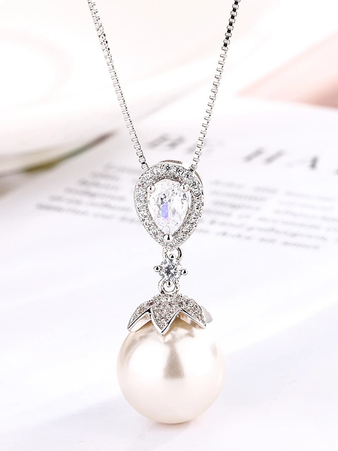 White pearl pendant