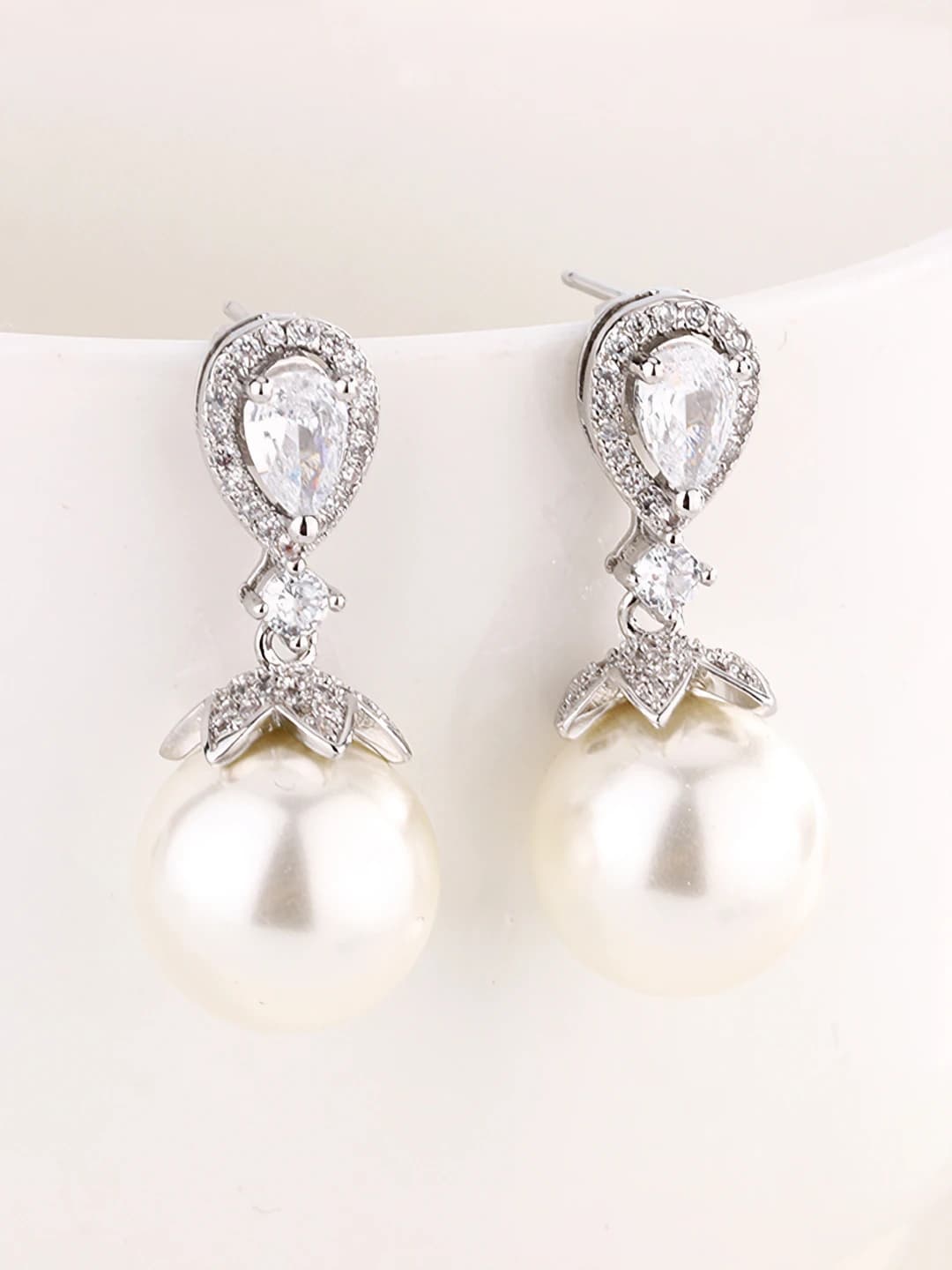 White pearl stud earrings