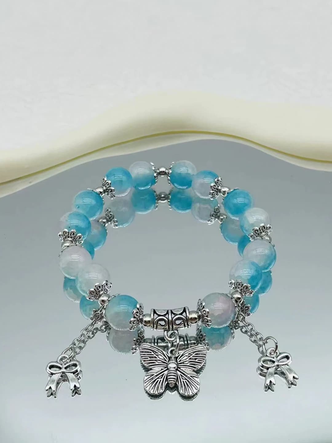 Teal porcelain butterfly double tassel bracelet