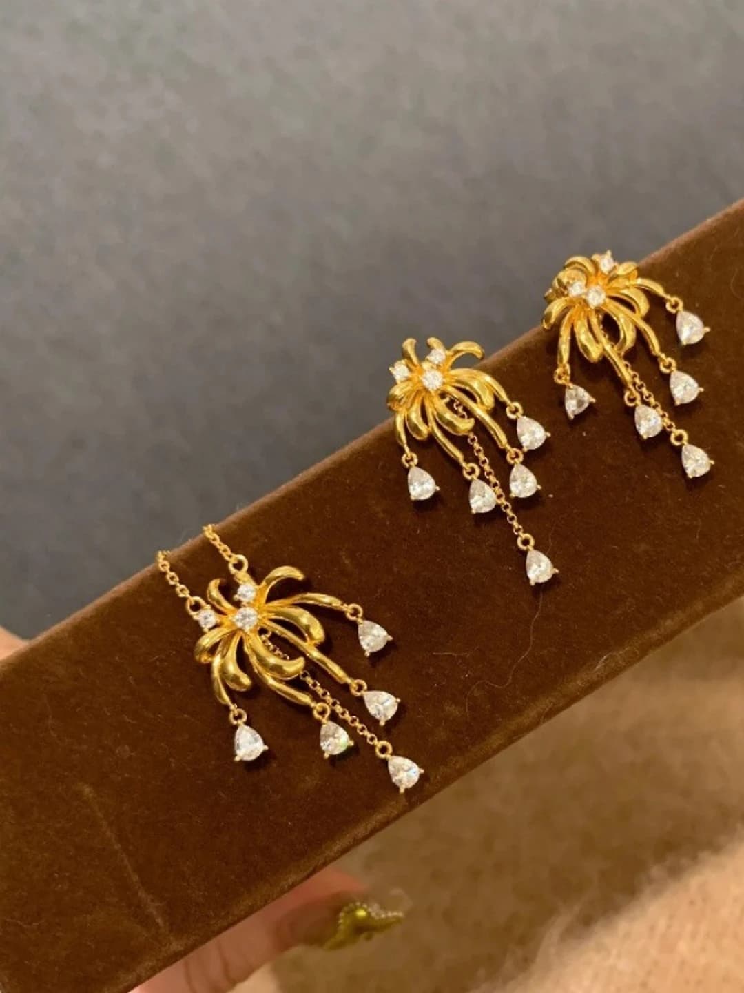 Women's dangle earrings with zircon and crystals, geometric shape, with tassels