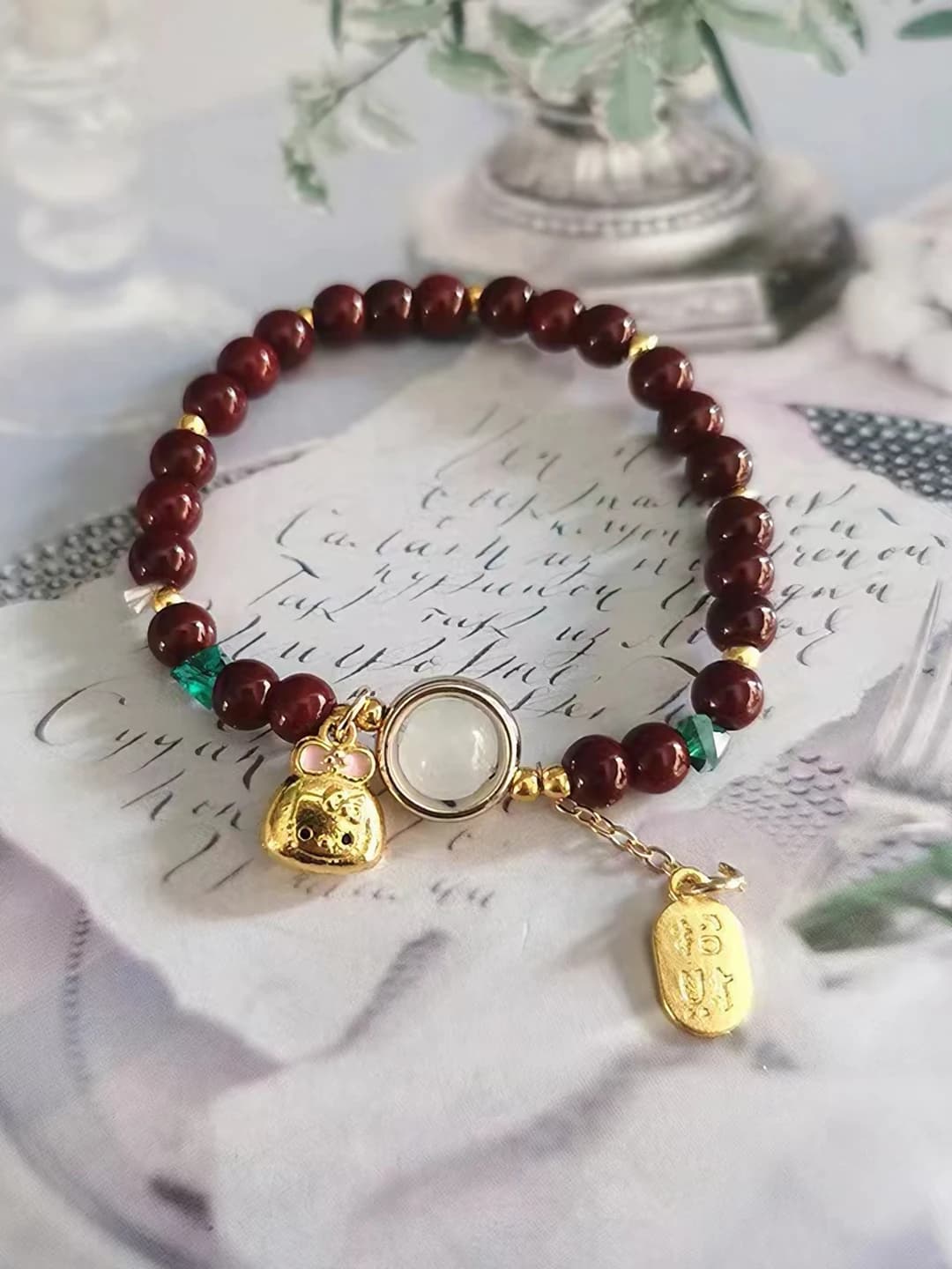 Gold powder KT cat cinnabar bracelet