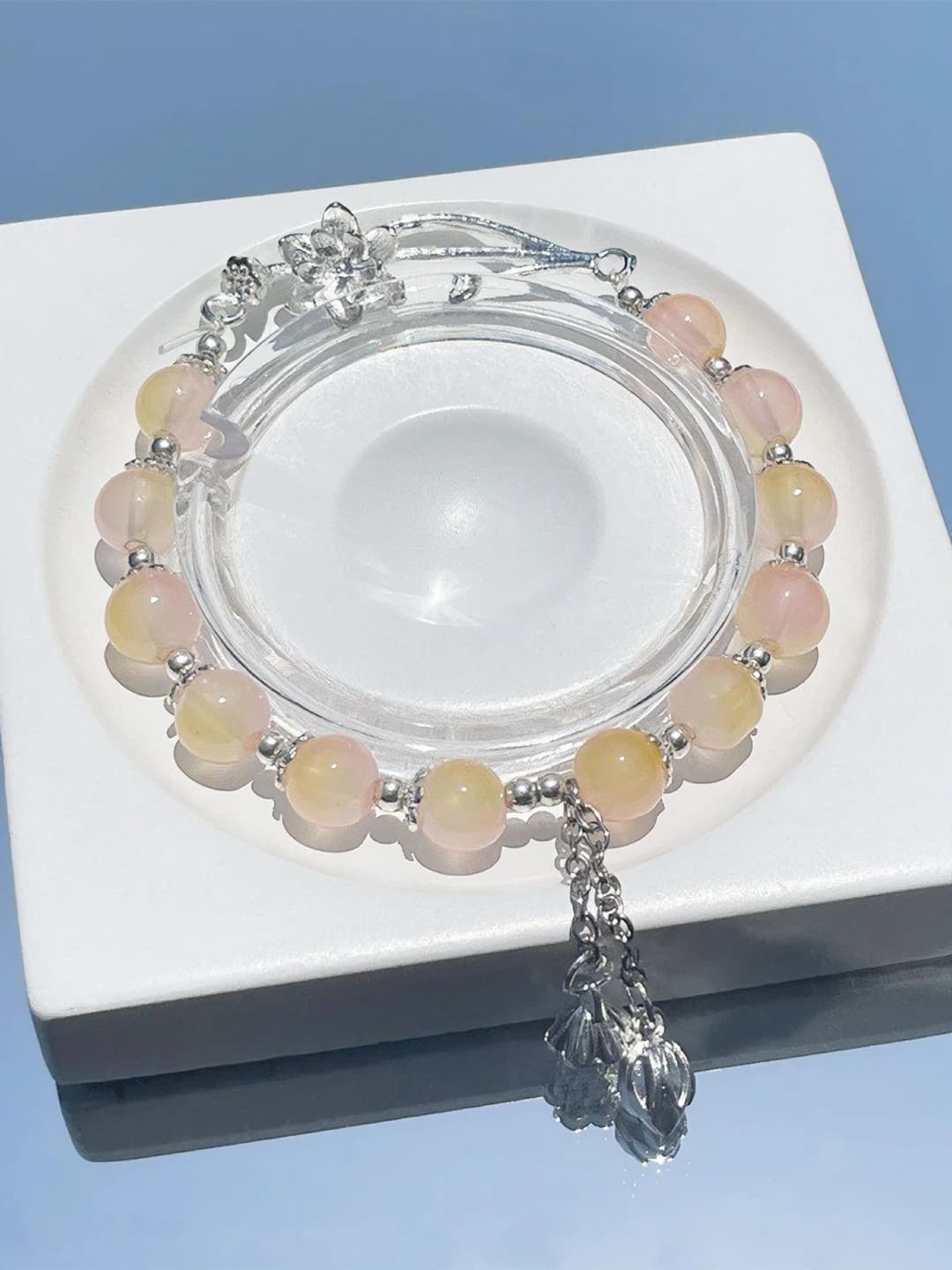 Orange-pink 'Lotus in Snow' bracelet