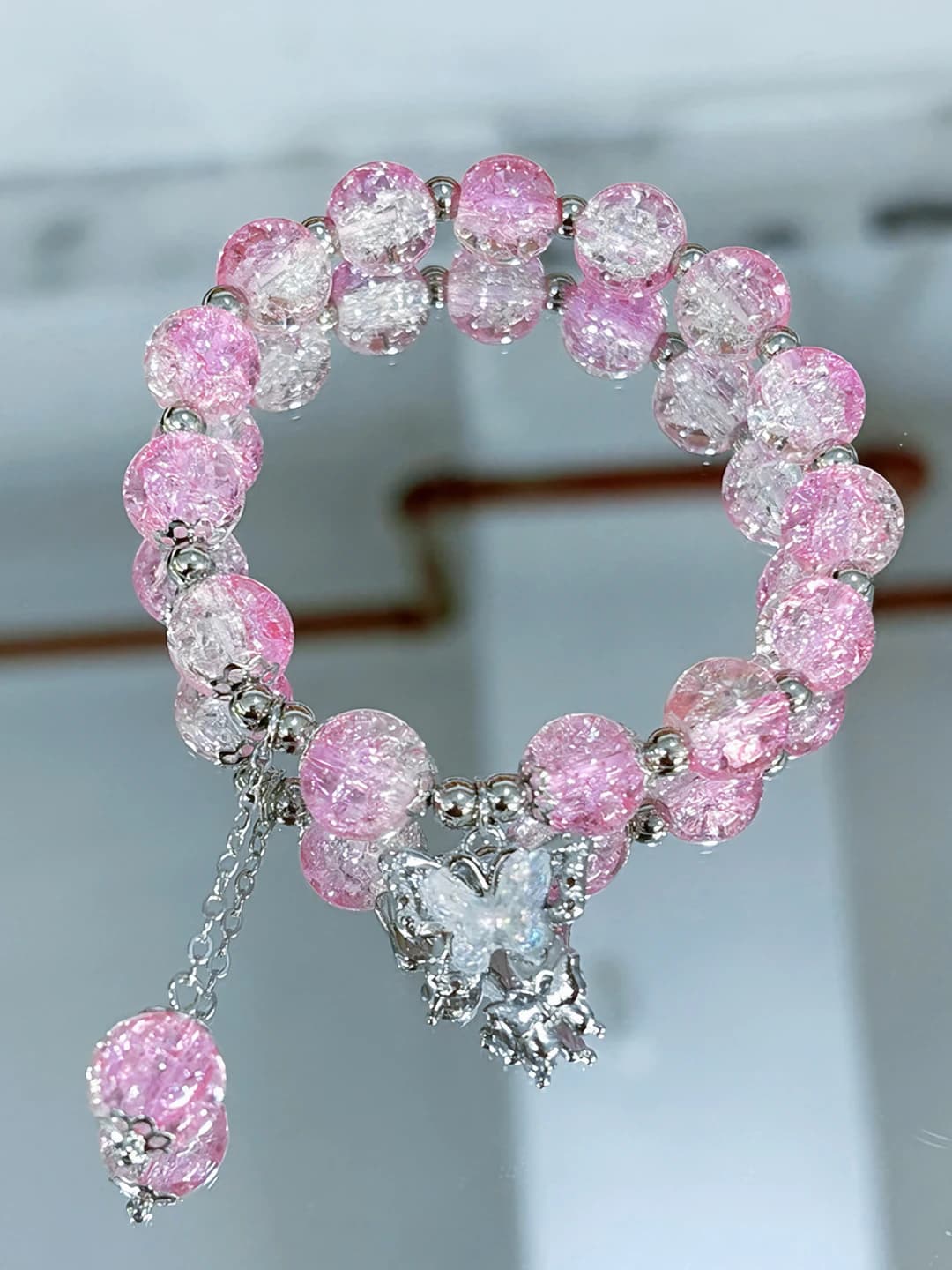 Pink beaded butterfly bracelet
