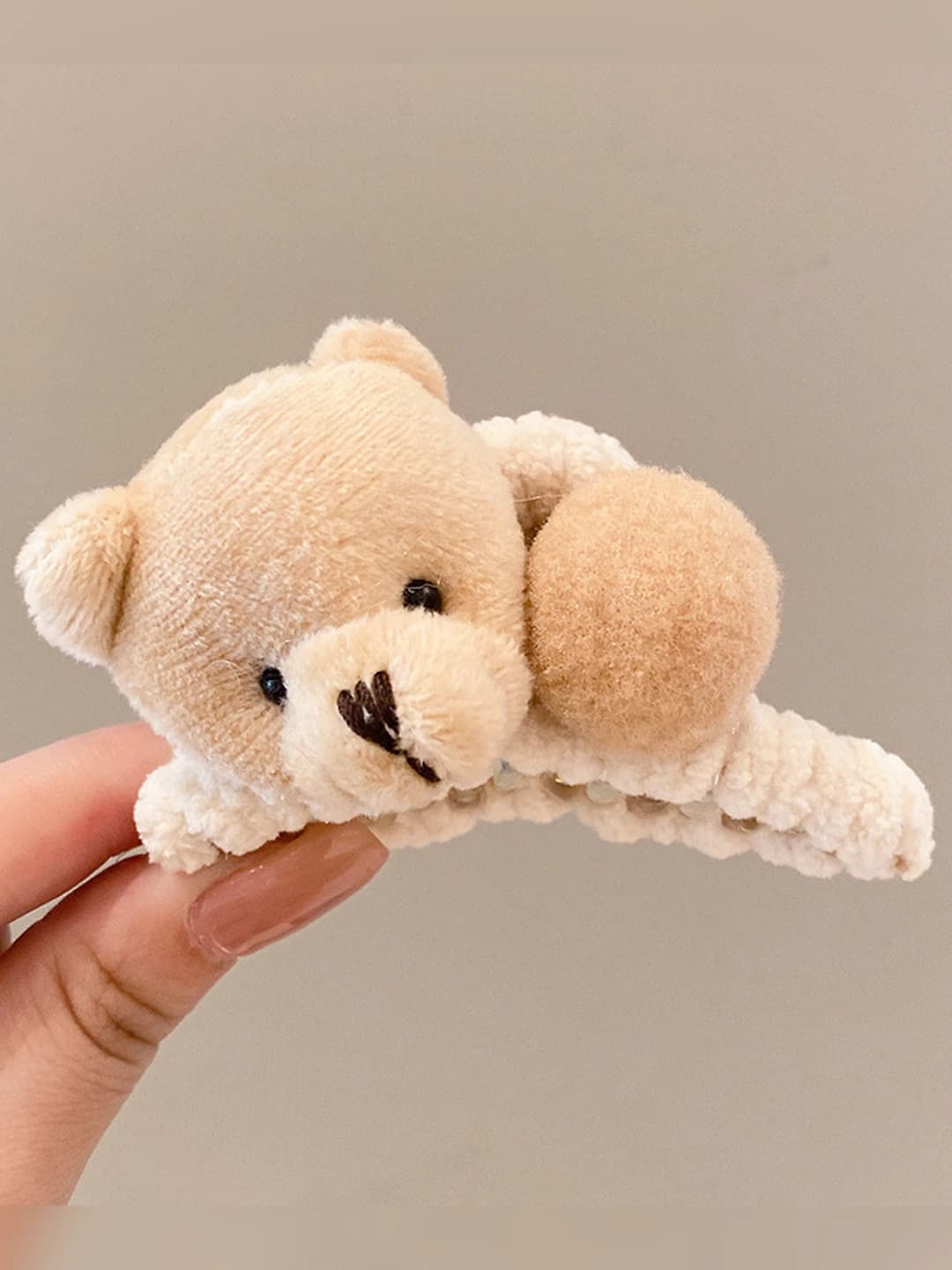 Small beige bear