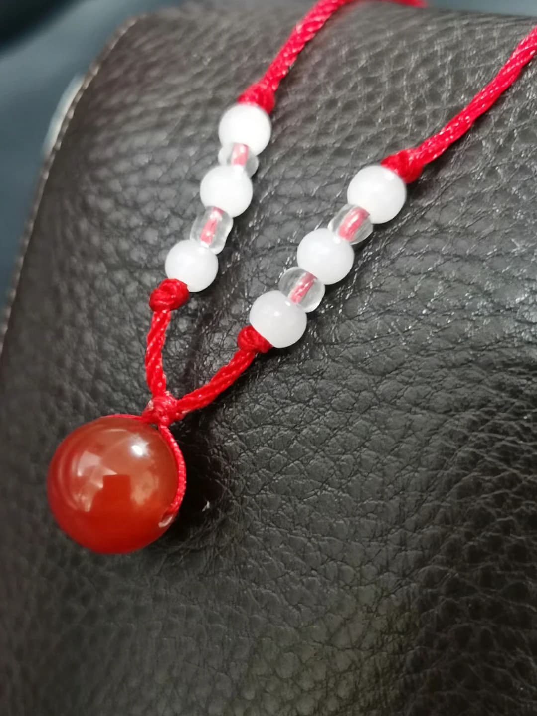 Red cord, red agate
