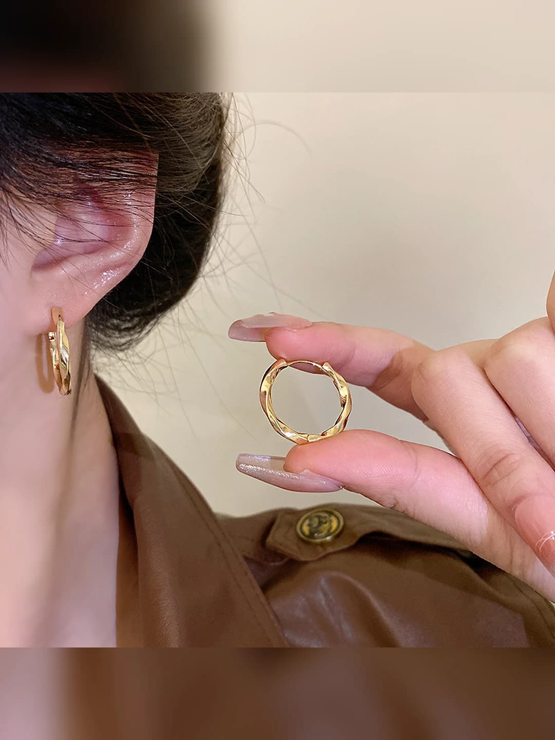 Women's Korean style geometric hoop earrings with irregular circle design, made of copper with electroplating