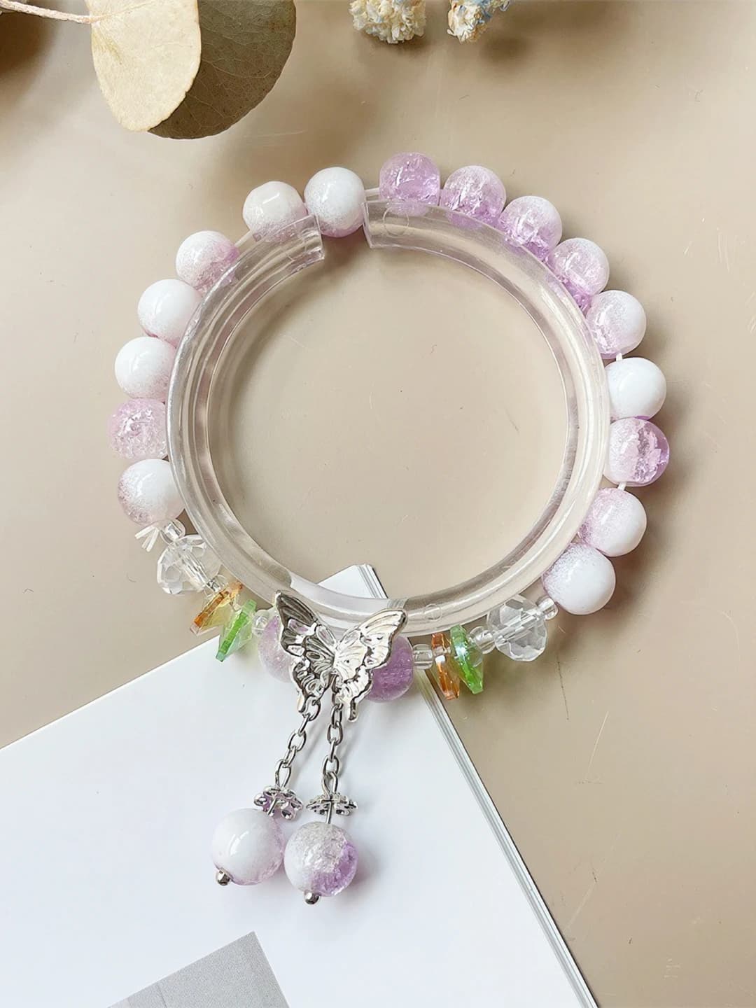 Purple, cream top, tassel, butterfly