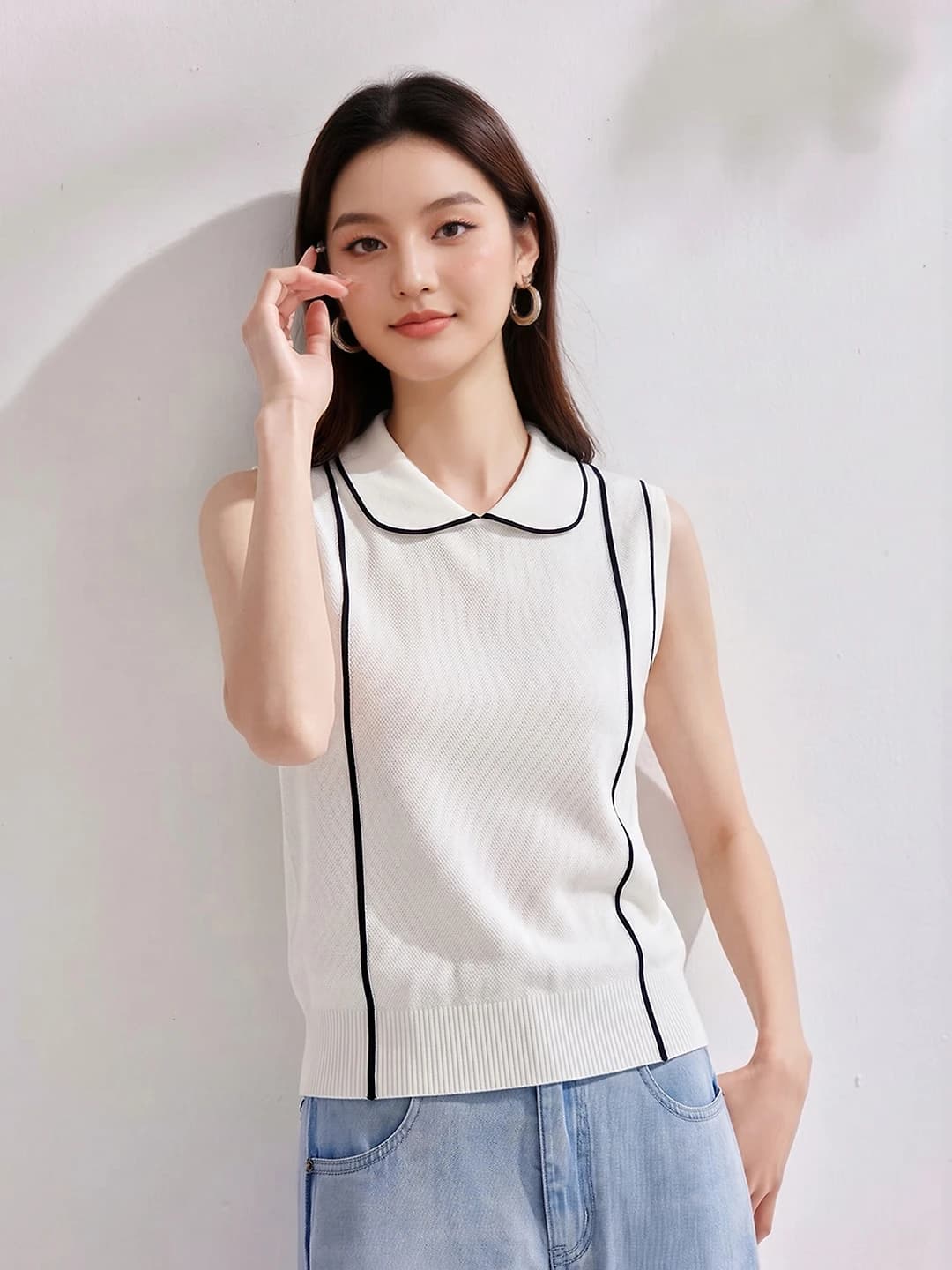 Ayollar uchun to'qima yengsiz top: bir rangli, bo'sh (oversize) kesim, 2026 yil yozgi yangi model
