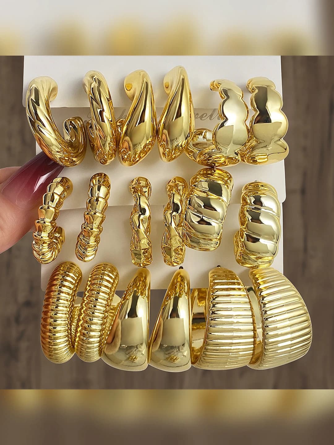 Women's set of 9 geometric teardrop-shaped earrings